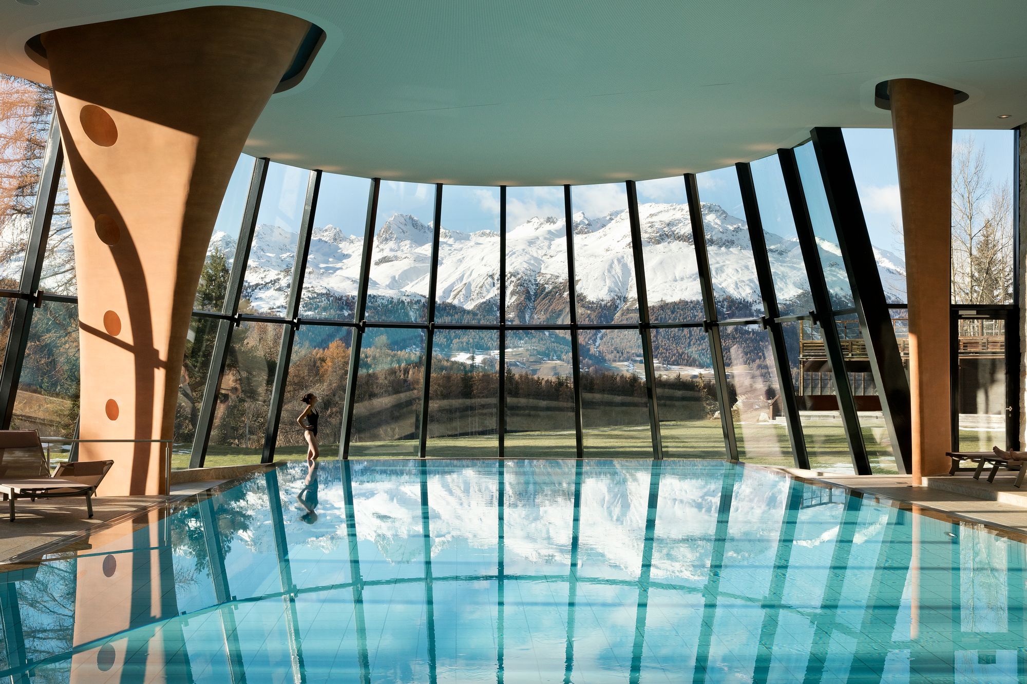 This grand Swiss hotel boasts an infinity pool, vintage bowling alley and glacier views