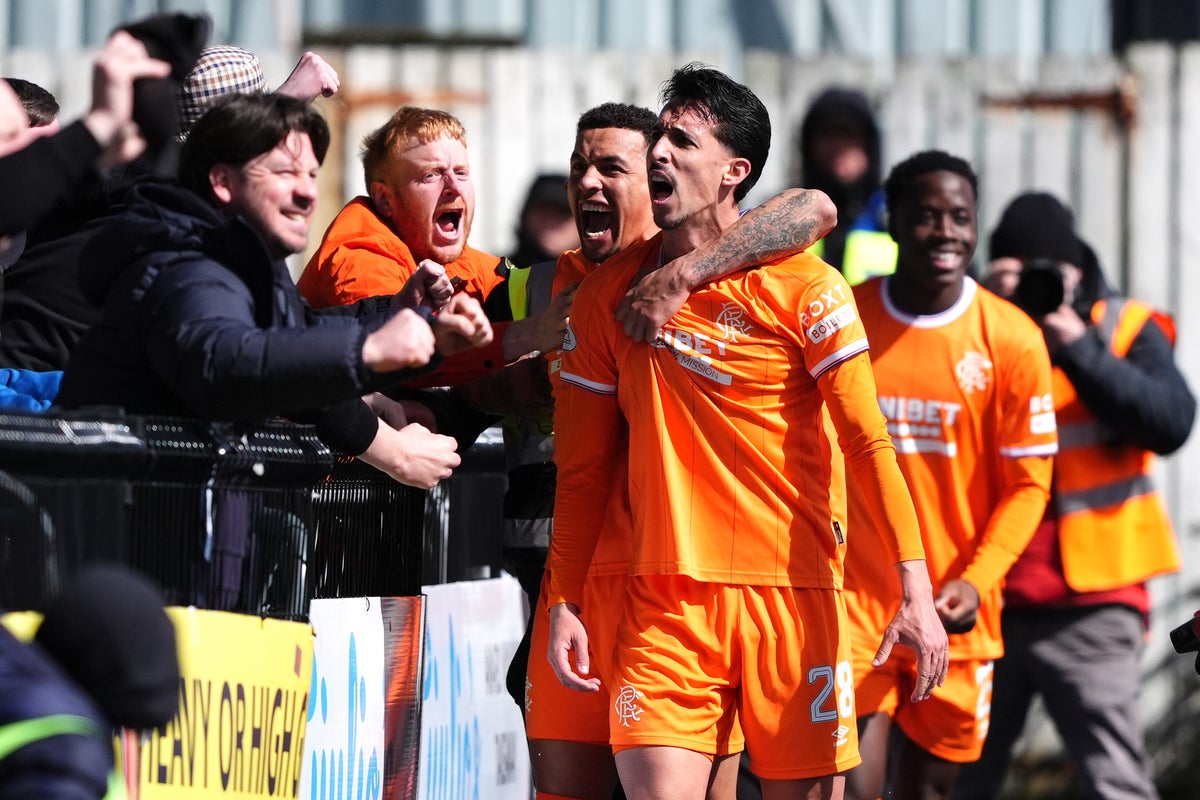 Rangers win nine-goal thriller with Falkirk to move within a point of leaders Hearts