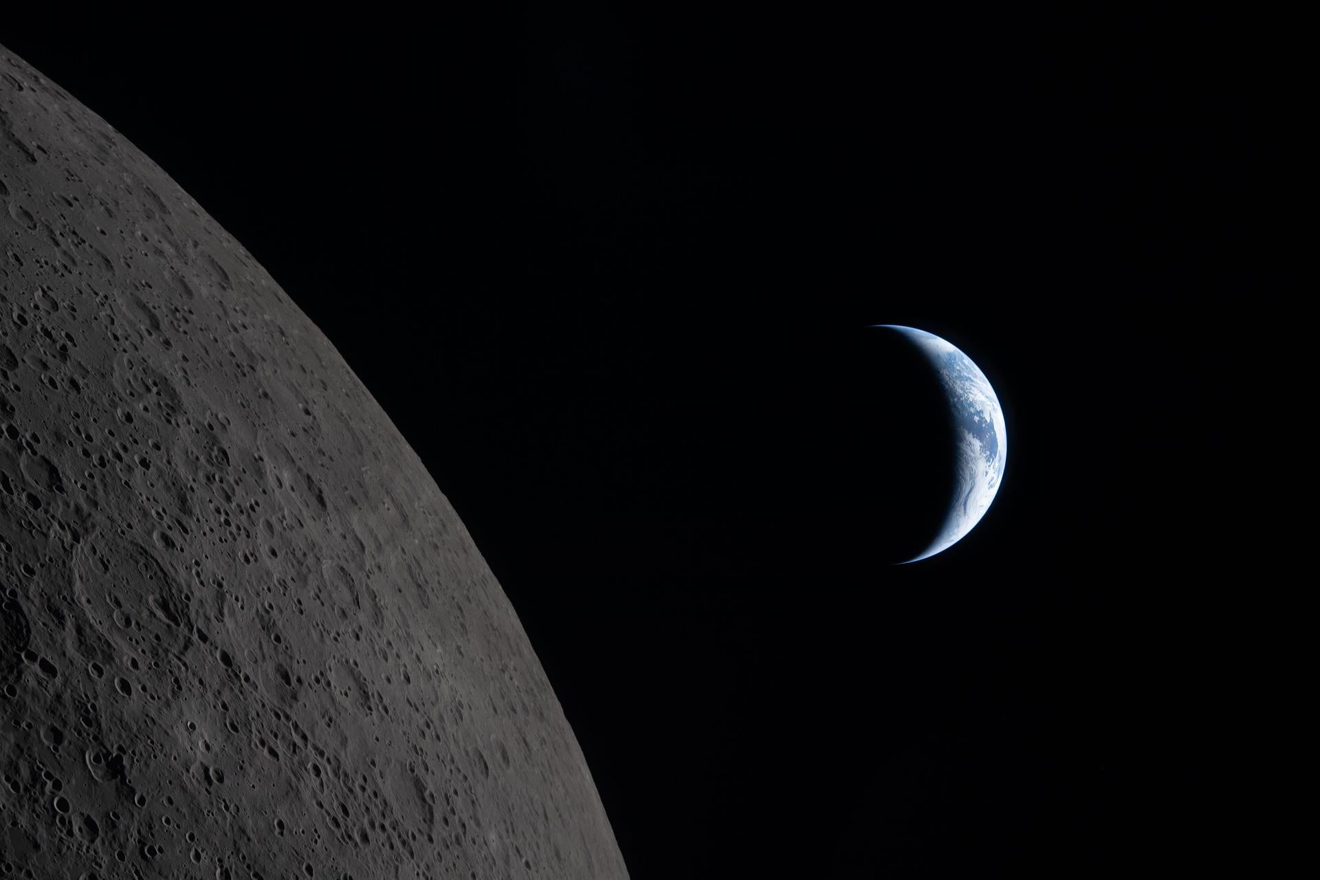 The Earth is seen behind the moon in this image captured by the Artemis II crew. After the success of the historic lunar flyby, the Trump administration is setting plans in motion for lunar nuclear reactors