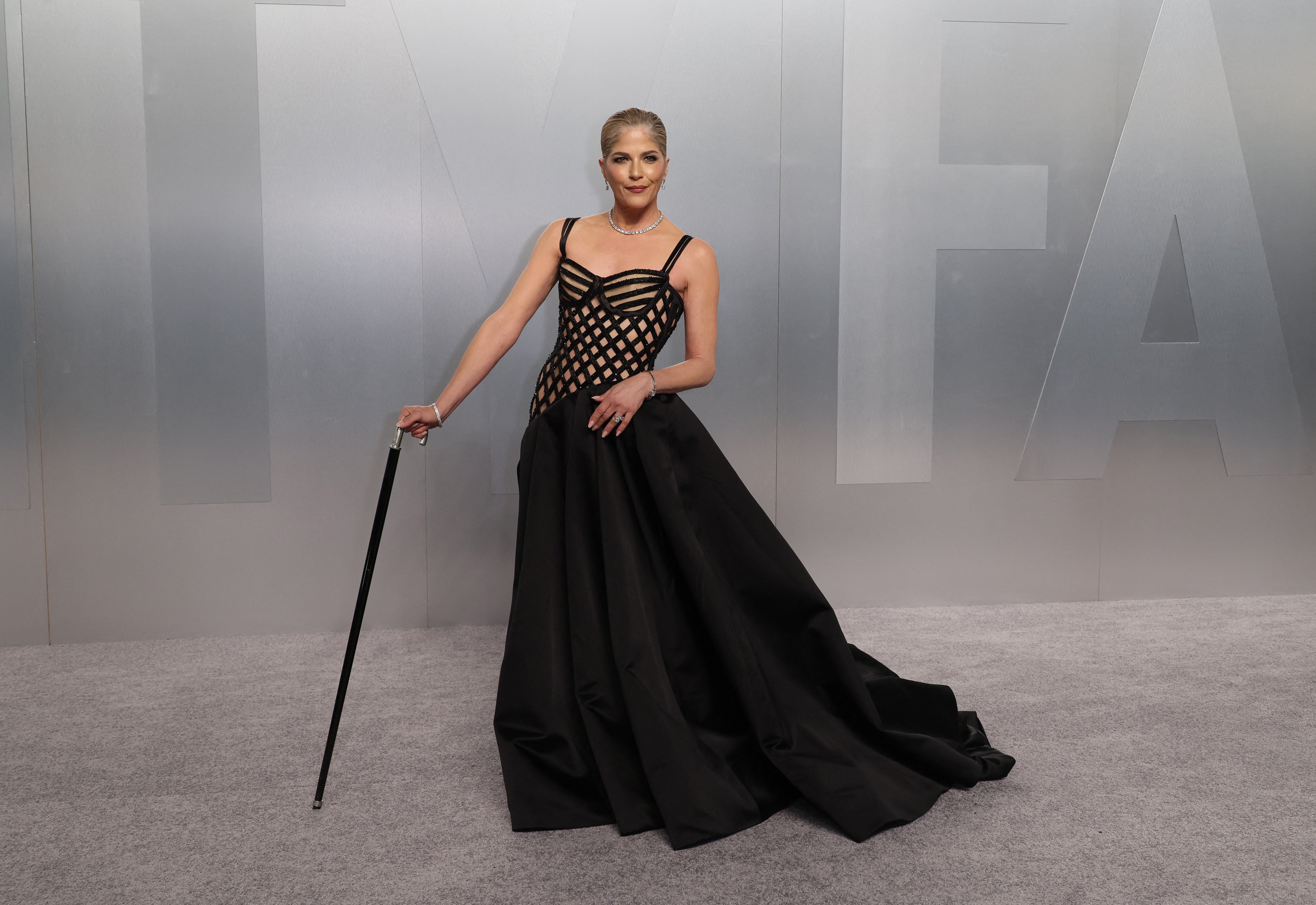 Blair attended the 2026 Vanity Fair Oscars Party, walking the carpet with a cane