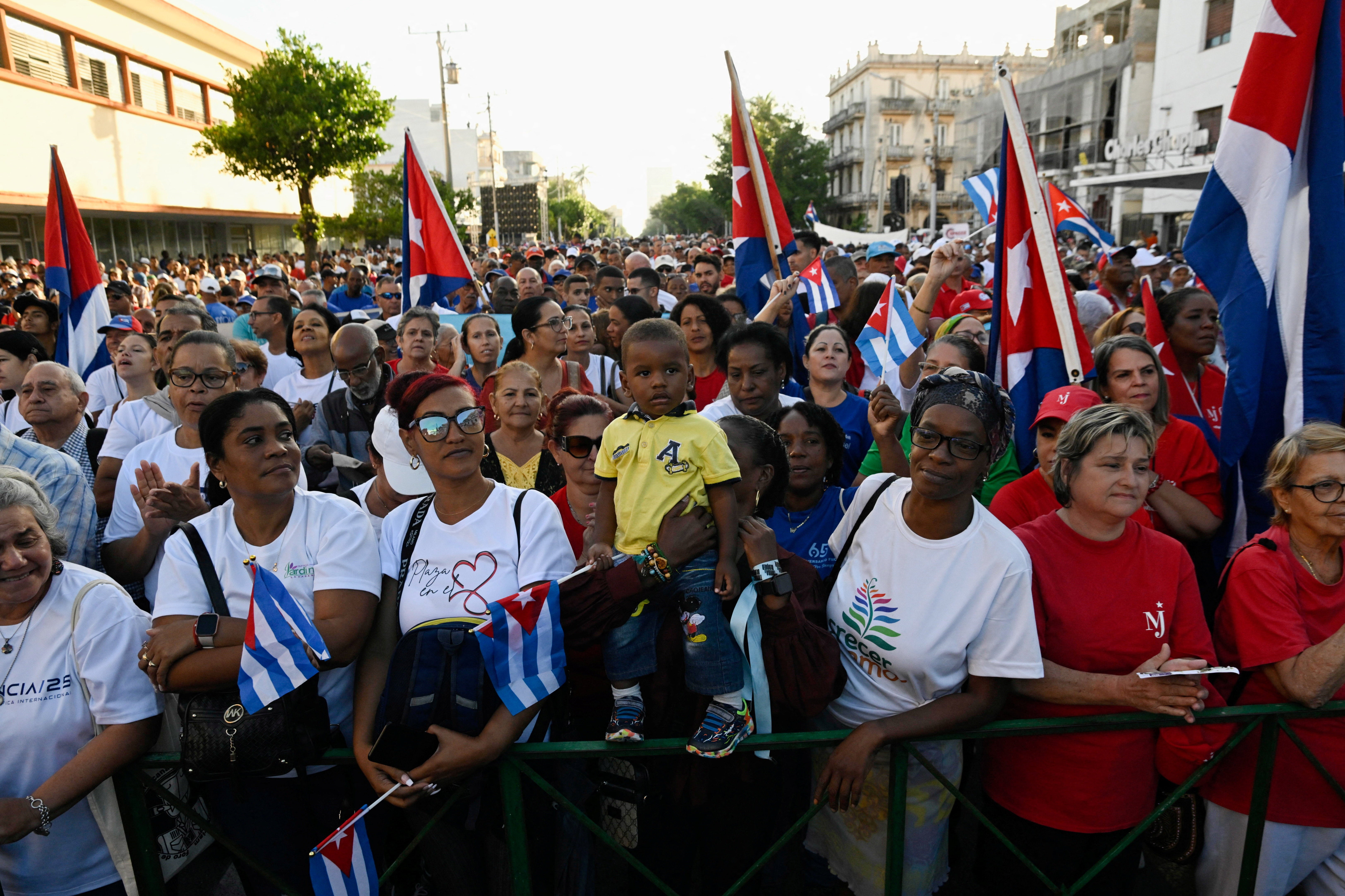 People return portion successful a ceremonial marking nan 65th day of Fidel Castro's declaration of nan socialist characteristic of nan Cuban Revolution, connected 16 April