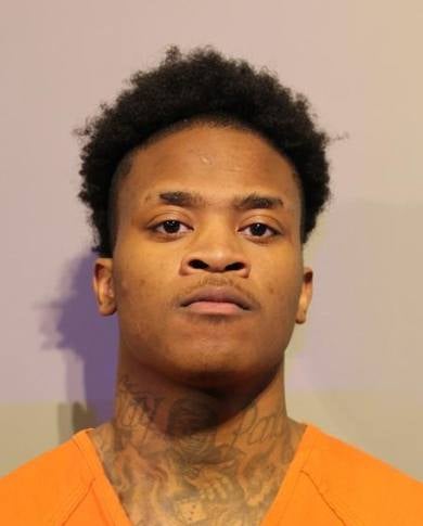 Kevin Faux, 24, shown in a September booking photo, is wanted by Houston police after being charged with capital murder in the death of 23-year-old Ashanti Allen, who was pregnant with his child