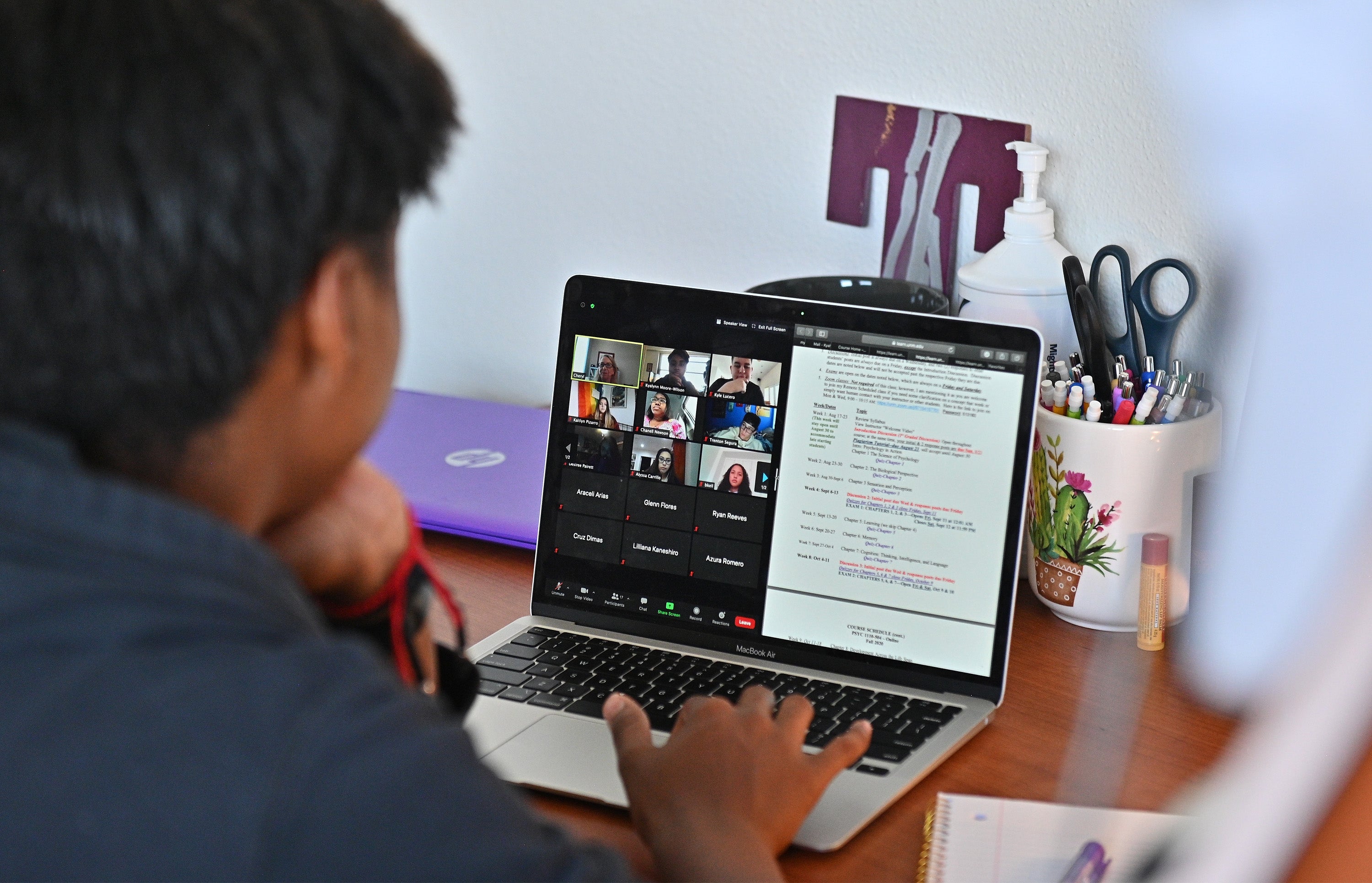 Kyalynn Moore-Wilson, a freshman, sits at a desk in her dorm room as she participates in a Zoom meeting for an 'Introduction to Psychology' course as classes begin amid the coronavirus (COVID-19) pandemic on the first day of the fall 2020 semester at the University of New Mexico on August 17, 2020 in Albuquerque, New Mexico.