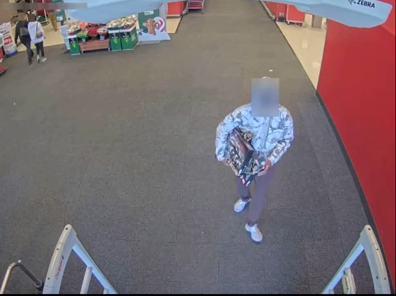 Police in Irvine, California, released a surveillance image they claim shows Jarrelle Augustine, 28, who has been charged with grand theft for allegedly stealing $34,000 worth of Lego