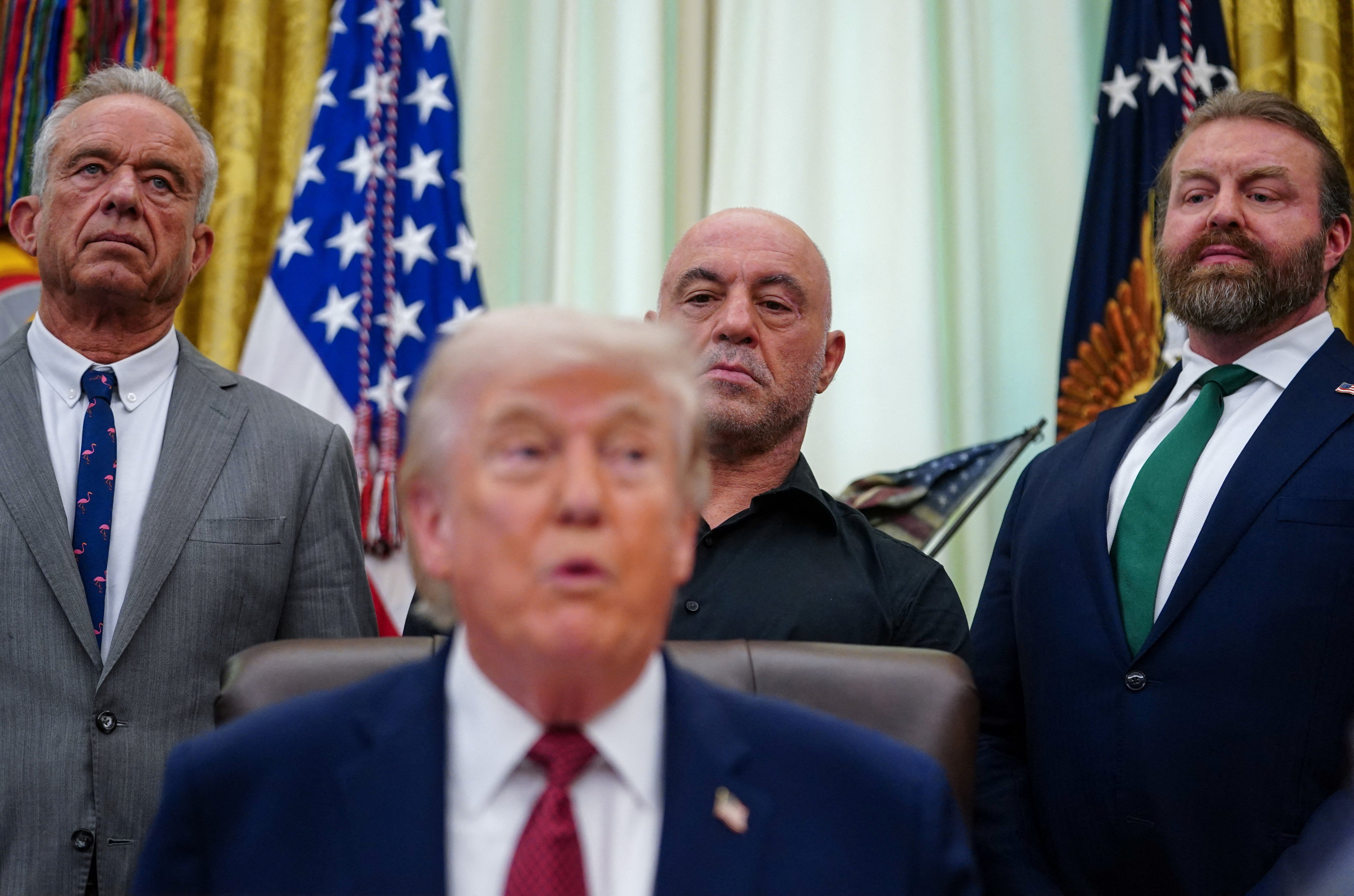 President Donald Trump cracked a joke about wanting to take a psychedelic drug during a White House event touting the benefits of the therapies, where Joe Rogan was a special guest