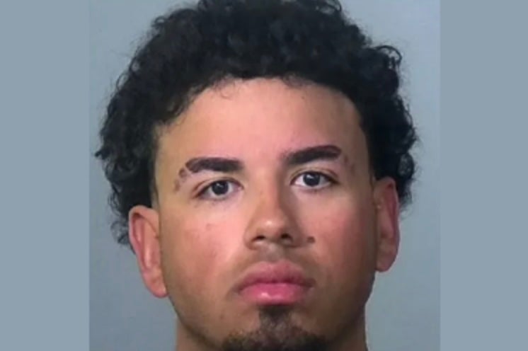 A insignificant convention catcher pinch nan Atlanta Braves has been arrested aft leaving nan segment of a deadly deed and tally crash, according to nan cops