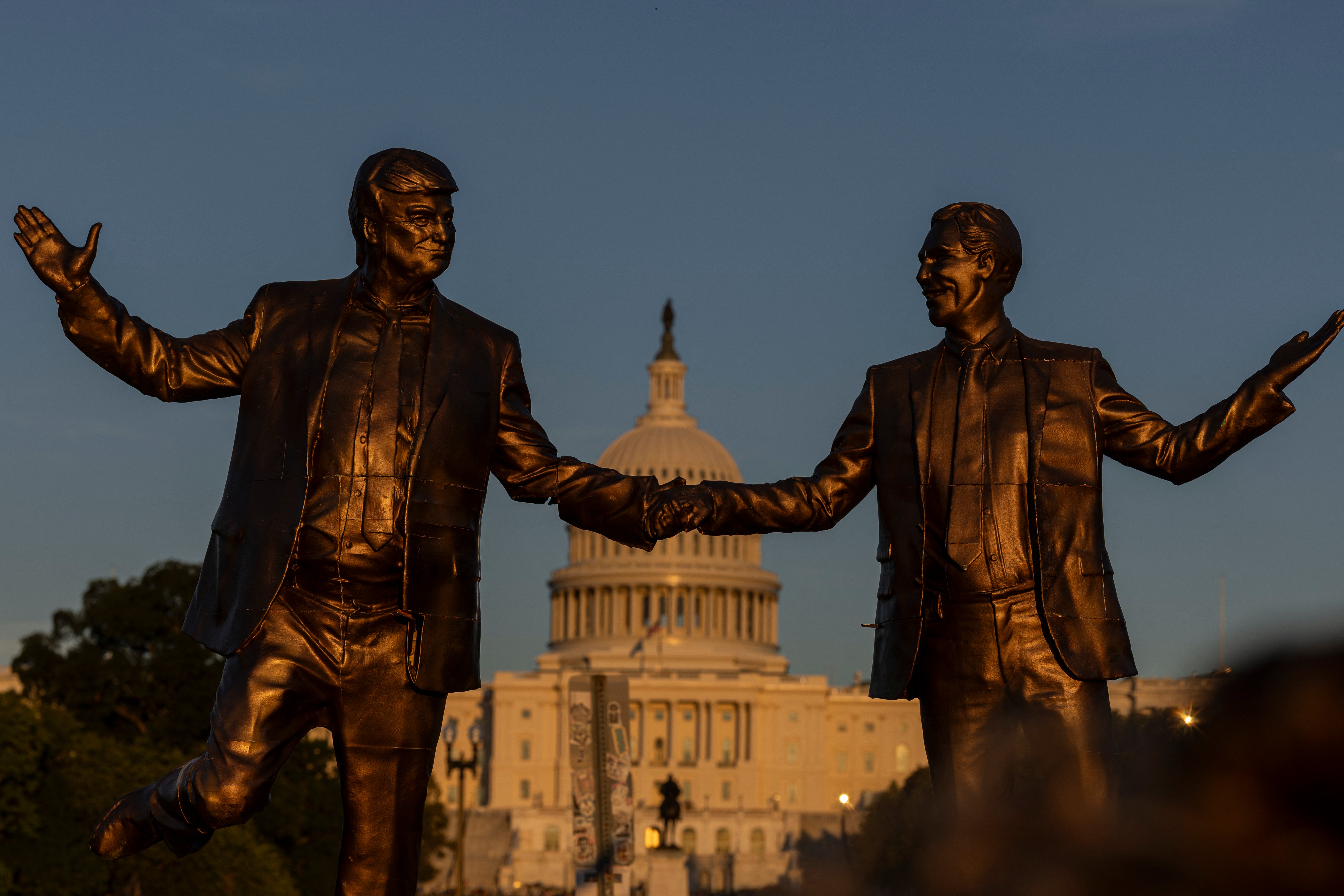 Pranksters antecedently protested Trump by placing a statue successful Washington depicting him holding hands pinch nan precocious activity criminal Jeffrey Epstein