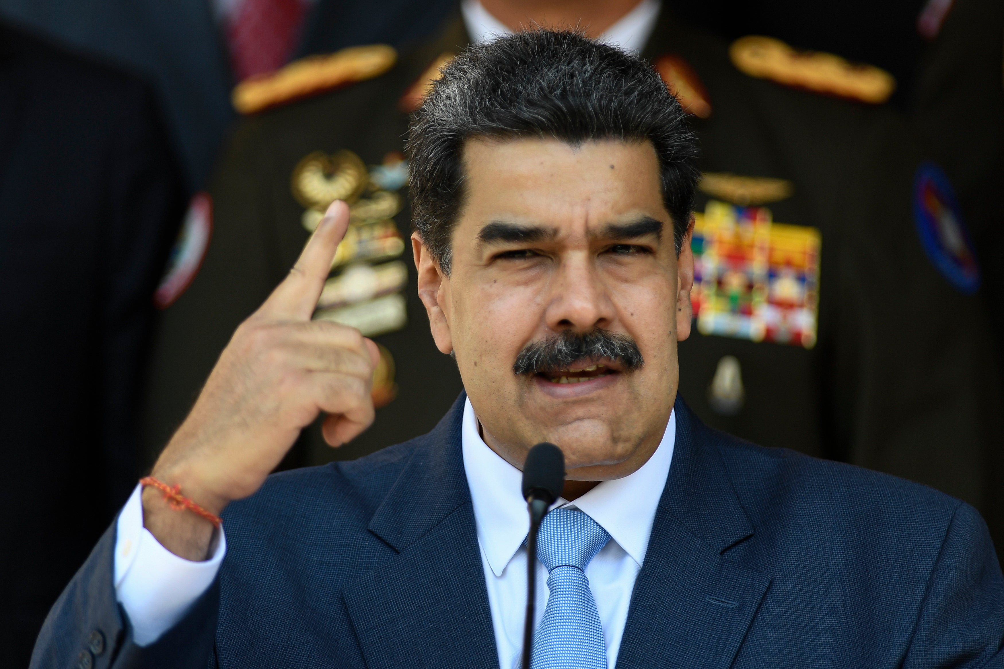 A U.S. typical forces worker was arrested aft making $400,000 by correctly forecasting nan seizure of Venezuelan president Nicolas Maduro successful January