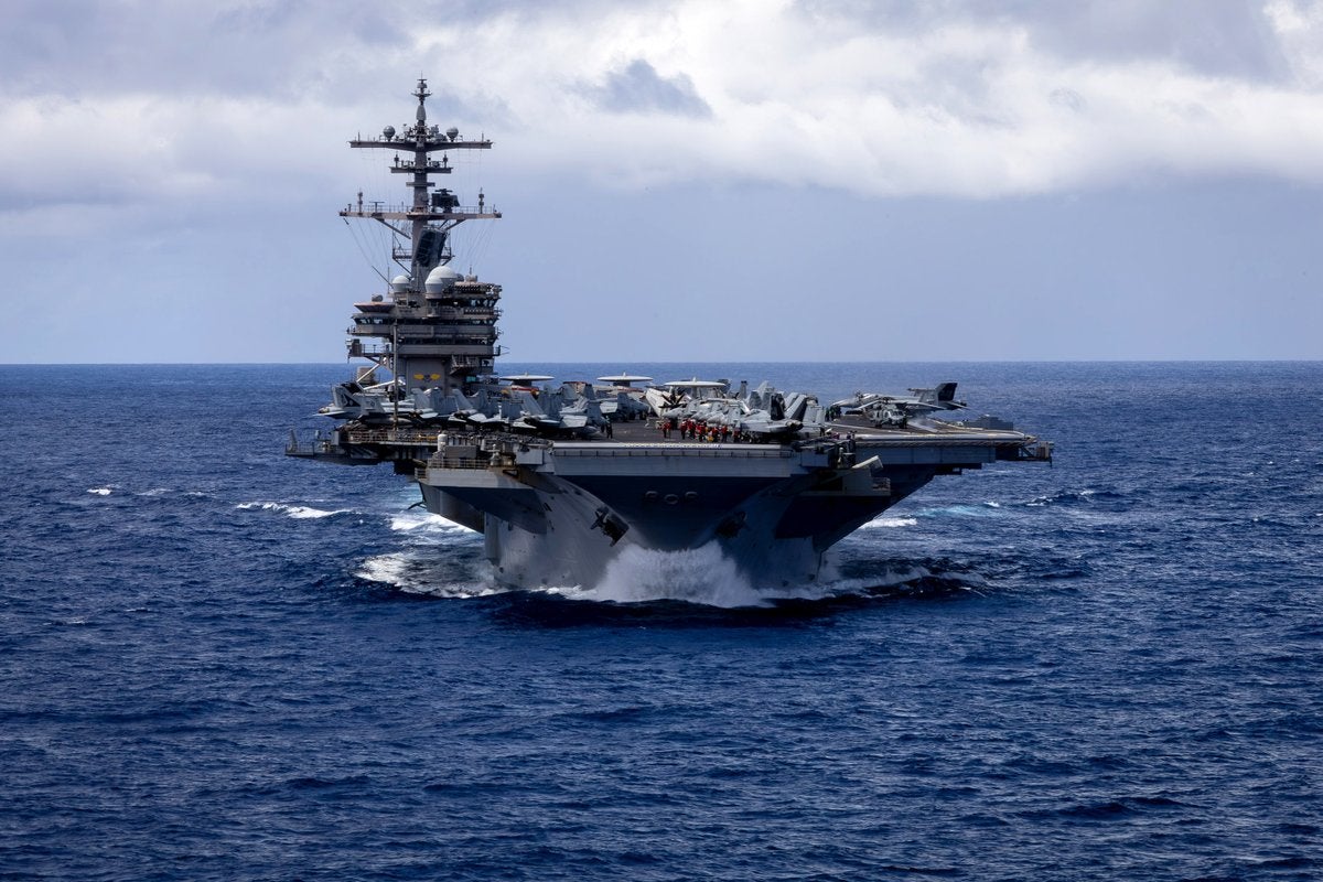 The USS George HW Bush sails in the Indian Ocean on Thursday