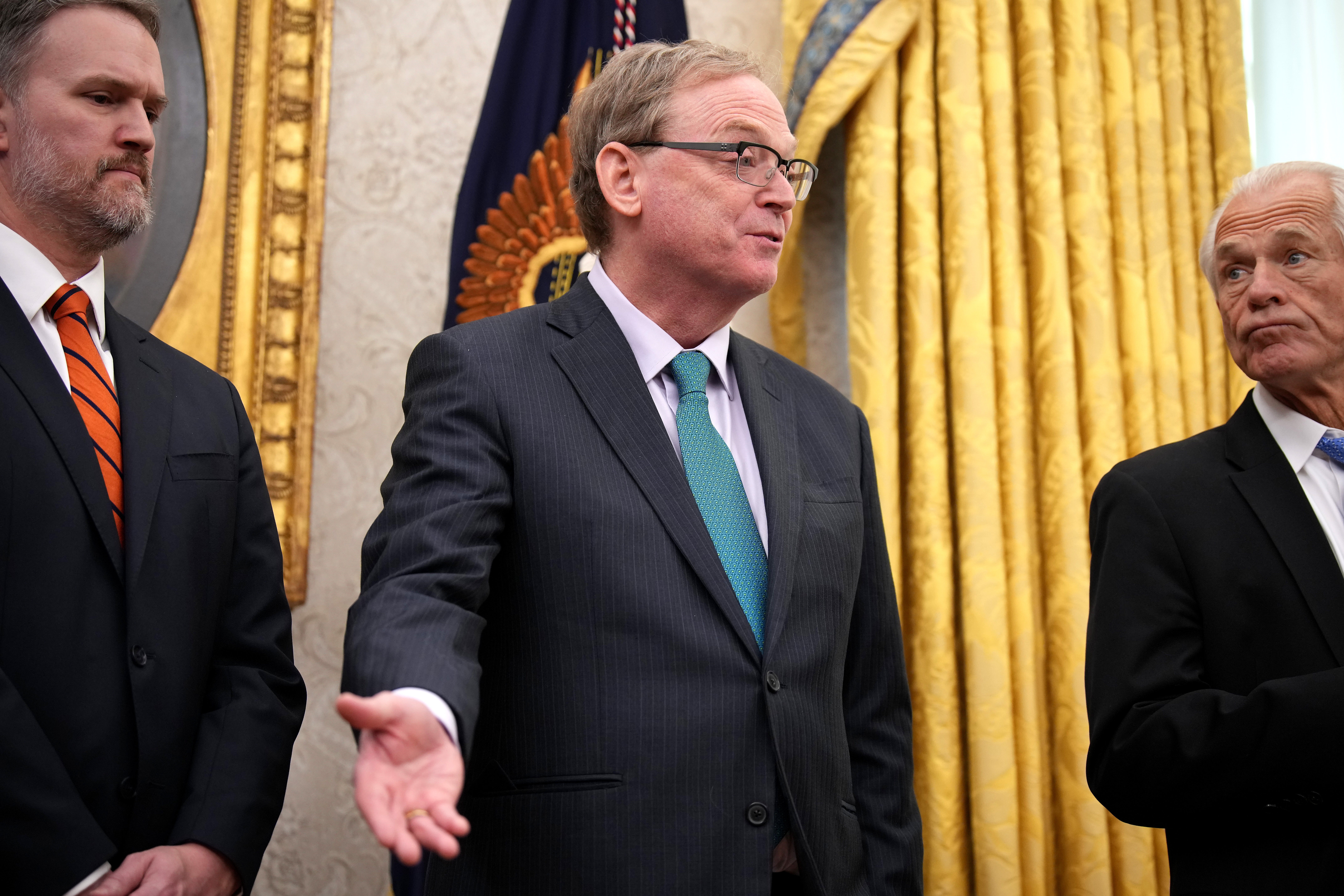 Director of nan National Economic Council Kevin Hassett (C), joined by U.S. Trade Representative Jamison Greer (L) and waste and acquisition advisor Peter Navarro, speaks aft President Donald Trump signed an executive bid connected reciprocal tariffs successful February