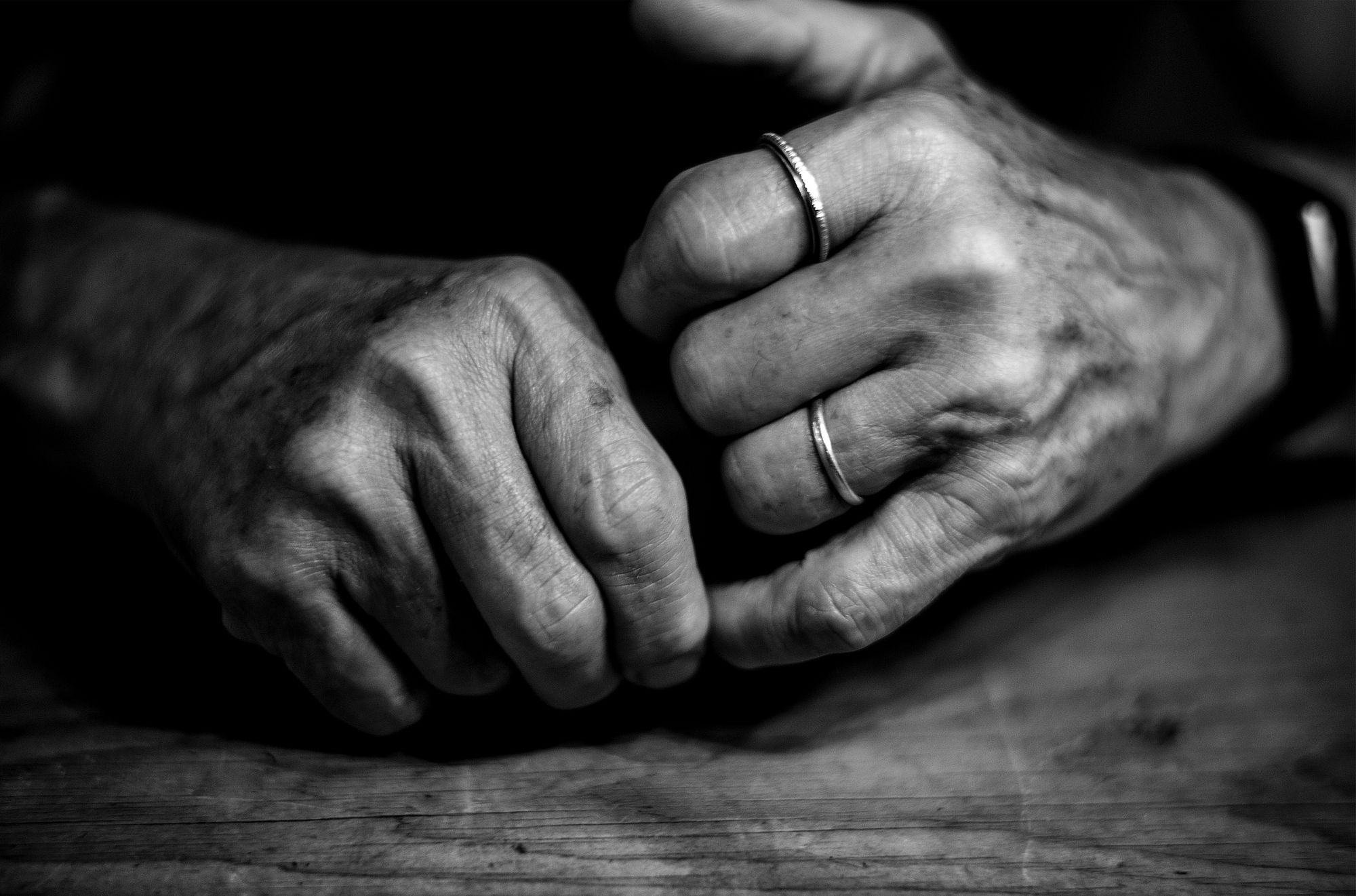 A closeup photograph of musician David Gilmour's hands, taken by his wife, author and artist Polly Samson