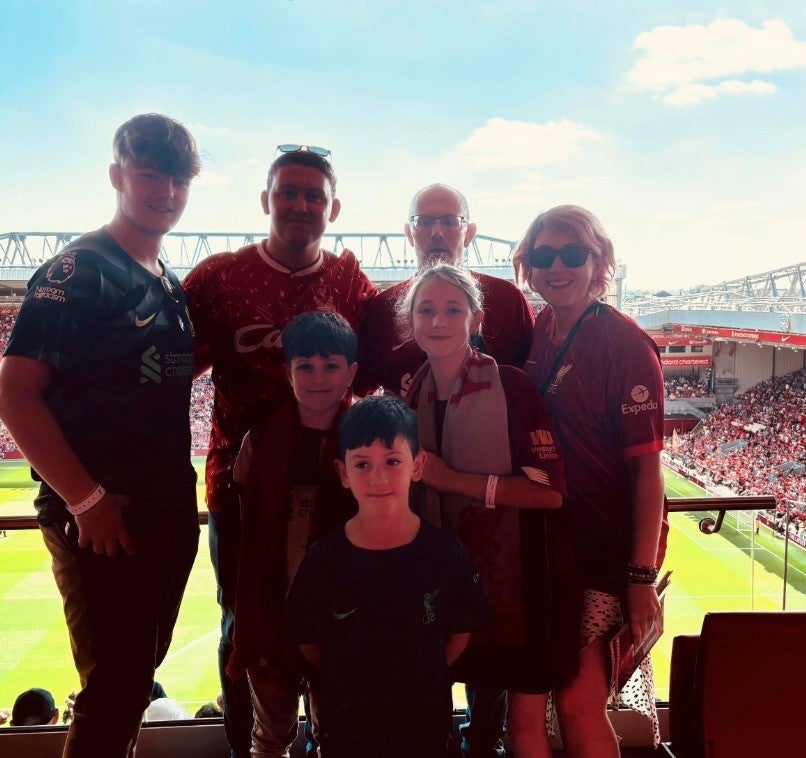 The family enjoying a day out at Liverpool’s Anfield stadium to watch a football match