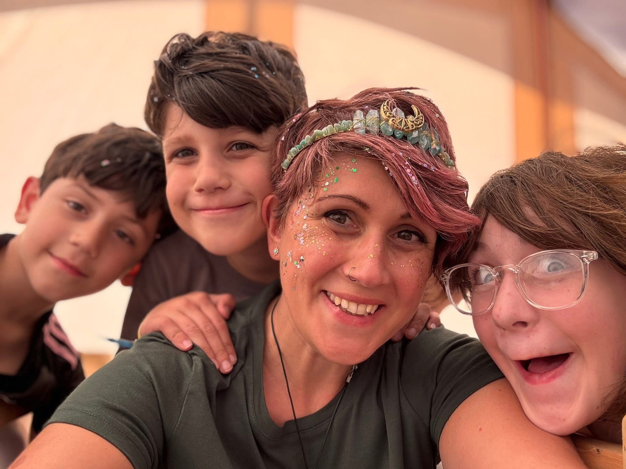 Jemma and the three children at a festival together after Jon died