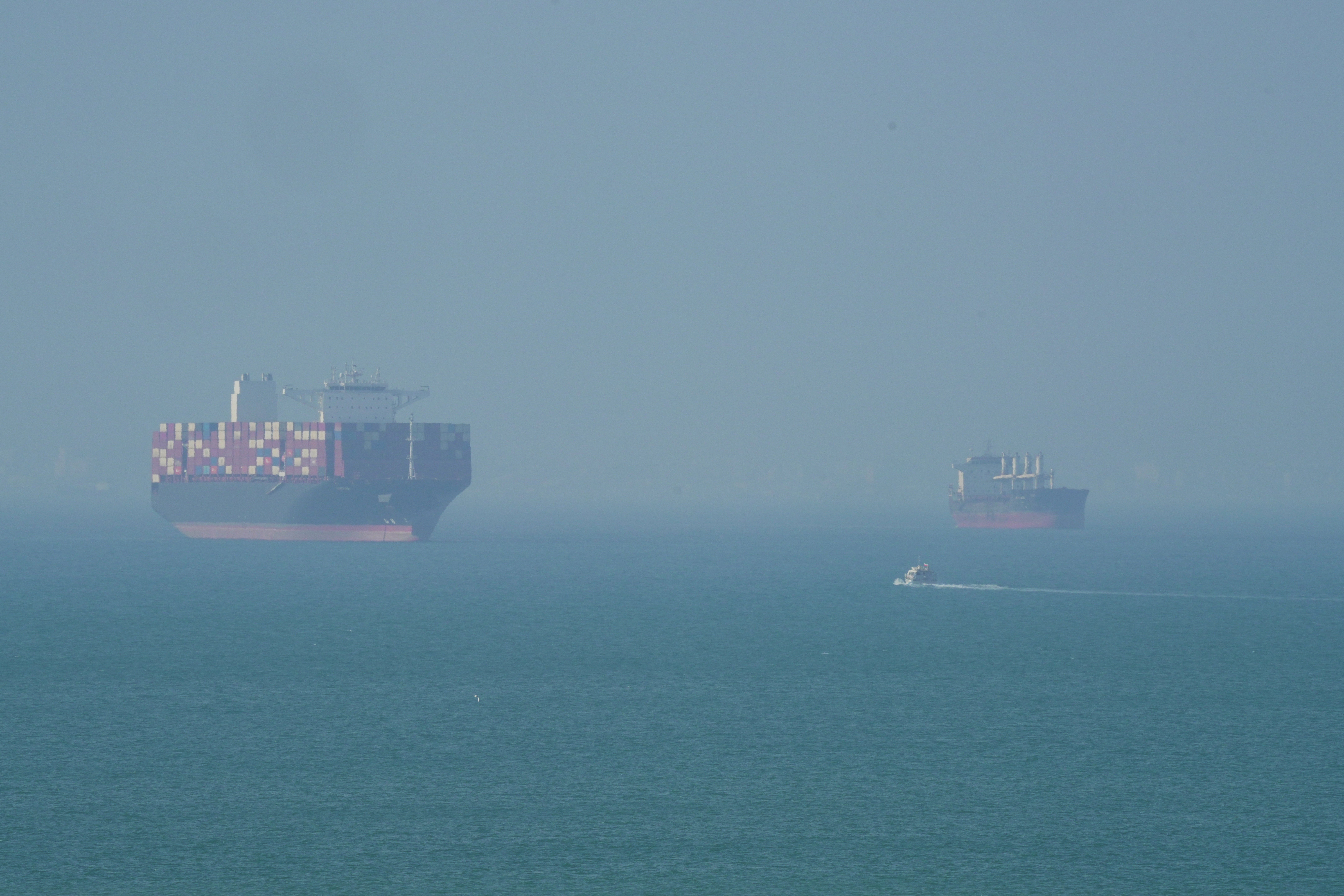 A cargo vessel navigates nan oversea adjacent Qeshm Island successful nan Strait of Hormuz, arsenic nan imaginable of a bid woody betwixt nan U.S. and Iran looks nary person to realization
