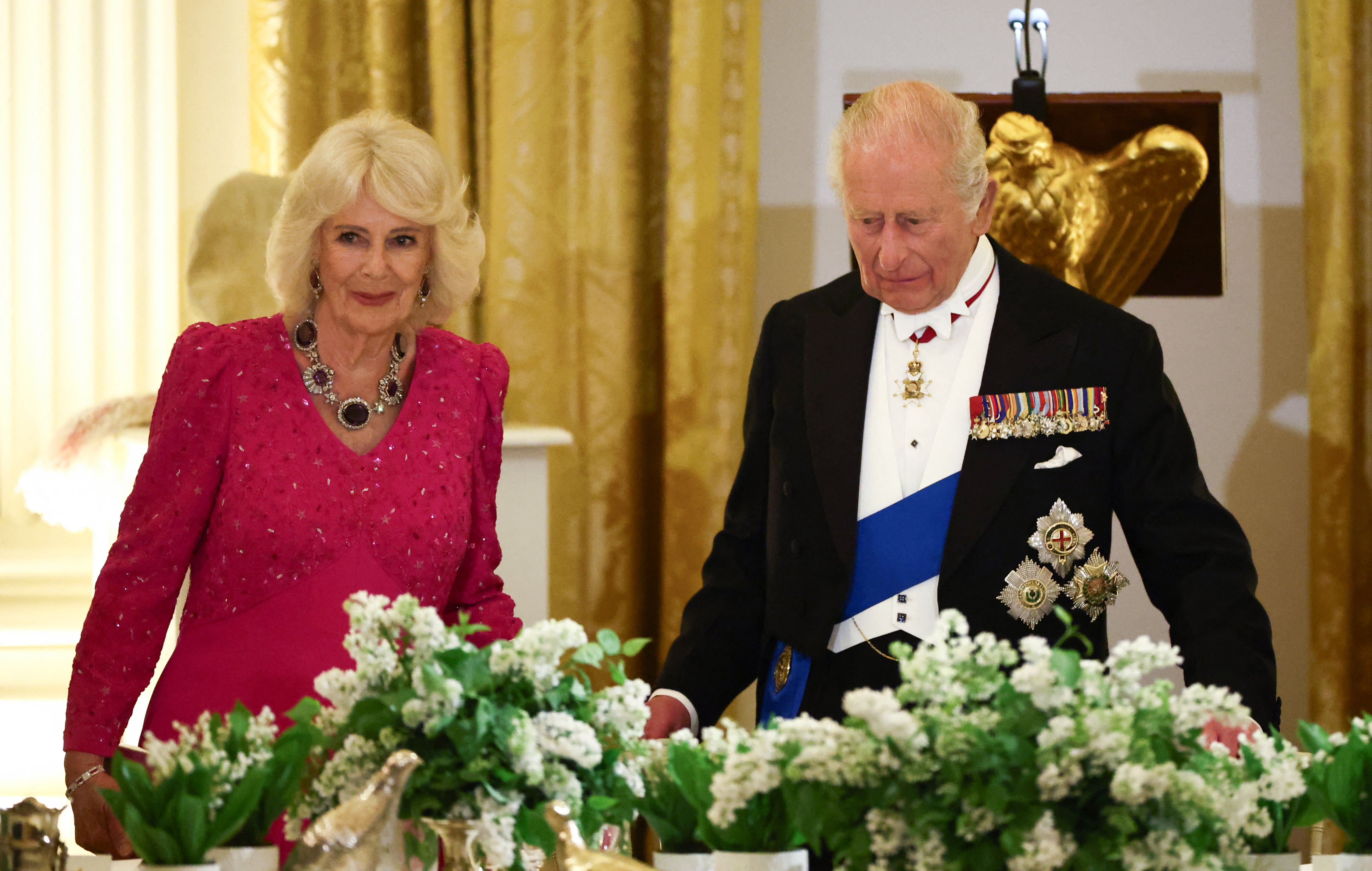 Britain's King Charles III and Queen Camilla be a State Dinner successful nan East Room of nan White House.