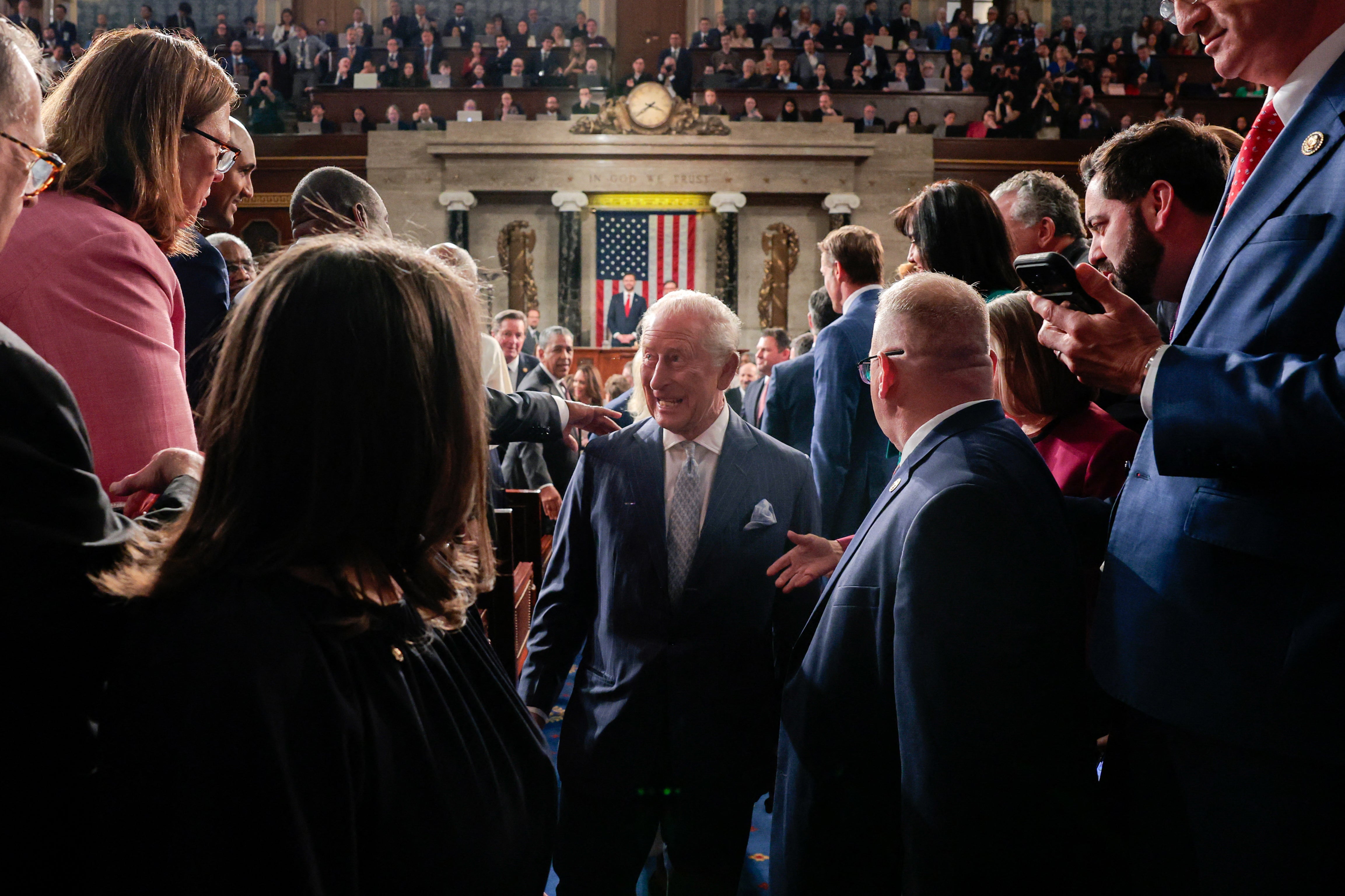 Britain's King Charles III is greeted by attendees aft addressing a Joint Meeting of Congress successful nan House Chamber astatine nan US Capitol successful Washington, DC, connected April 28, 2026. (Photo by KYLIE COOPER / POOL / AFP via Getty Images)