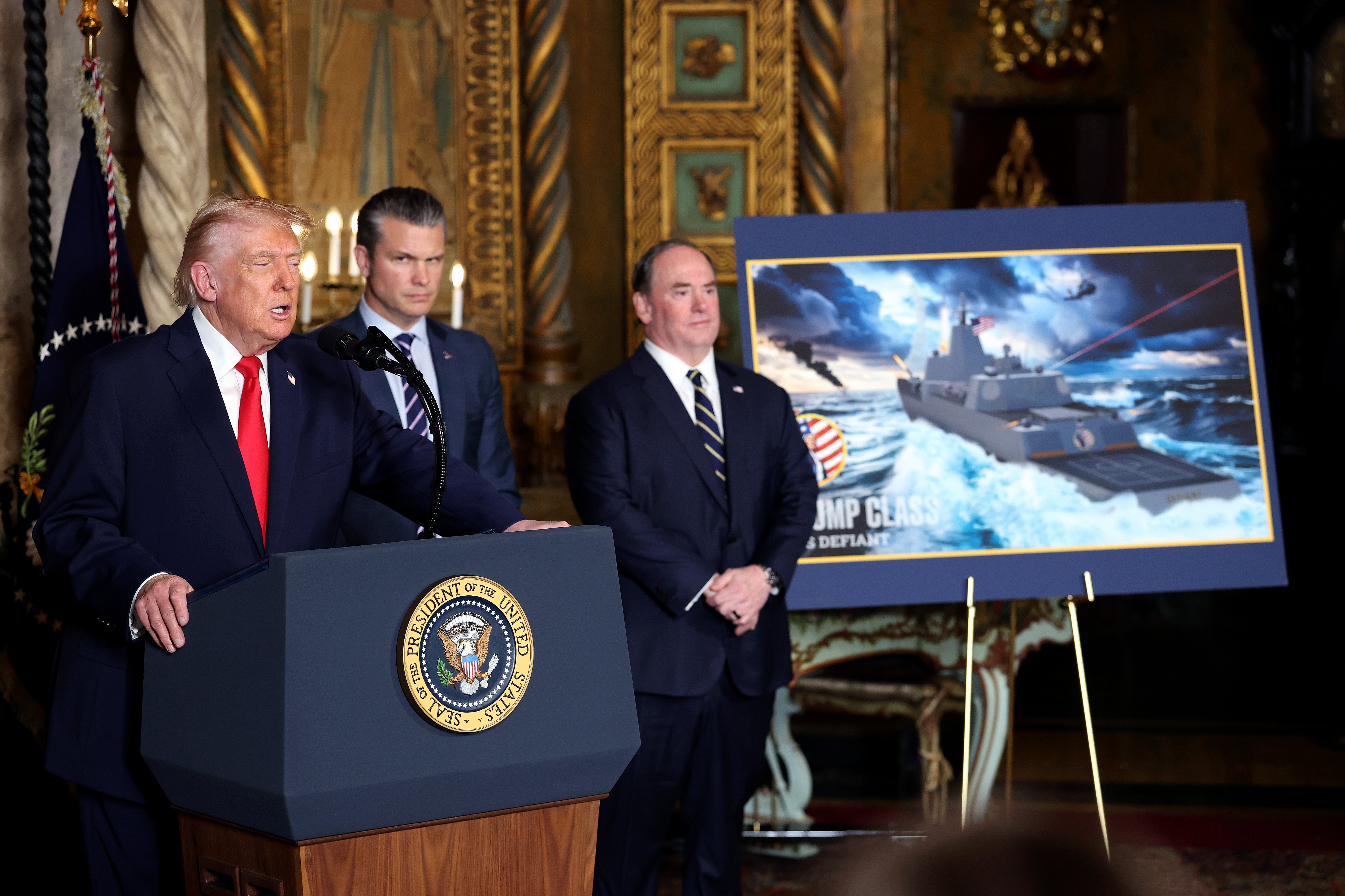 Trump, joined by Secretary of War Pete Hegseth, and erstwhile Secretary of nan Navy John Phelan, announced nan creation of nan “Trump-class” battleship during a connection to nan media astatine Trump’s Mar-a-Lago property successful December