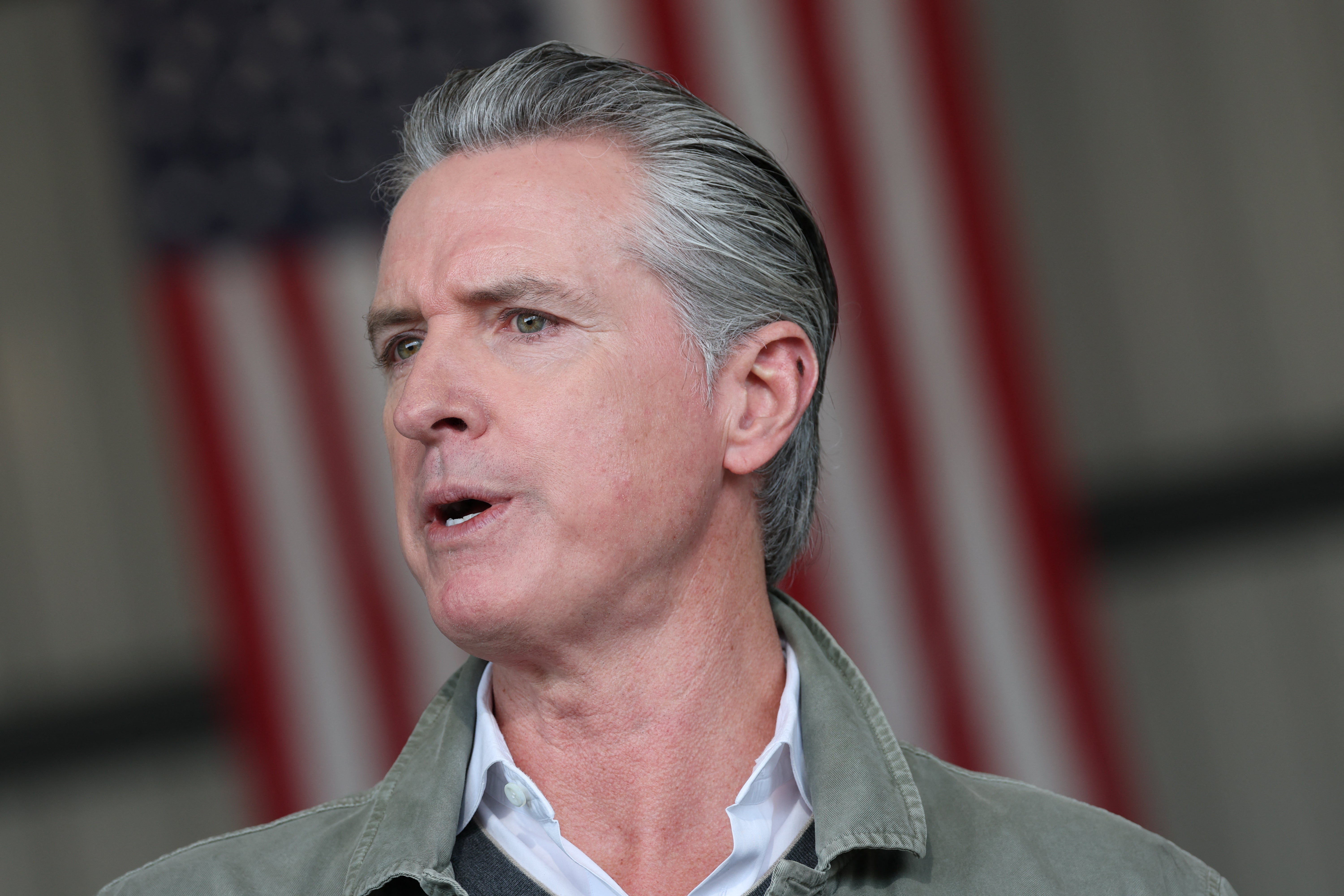 California Governor Gavin Newsom said Joe Rogan was 'too chicken' to have him on his podcast after the comedian called him a 'cardboard cutout of a person'