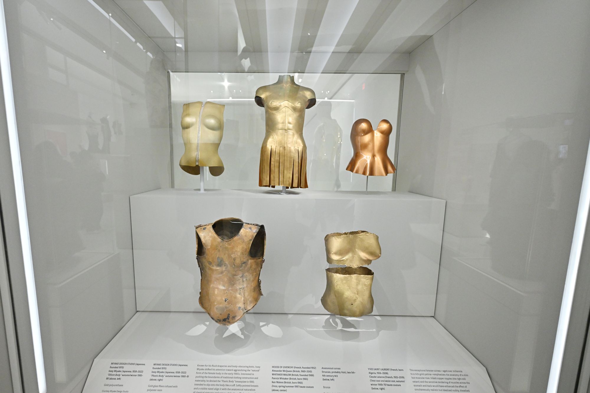 At the ‘Costume Art’ exhibit, Each garment at the exhibit is paired with an ancient artefact that represents the historical depictions of the feminine body, such as statues of Greek goddesses on pedestals and medieval busts