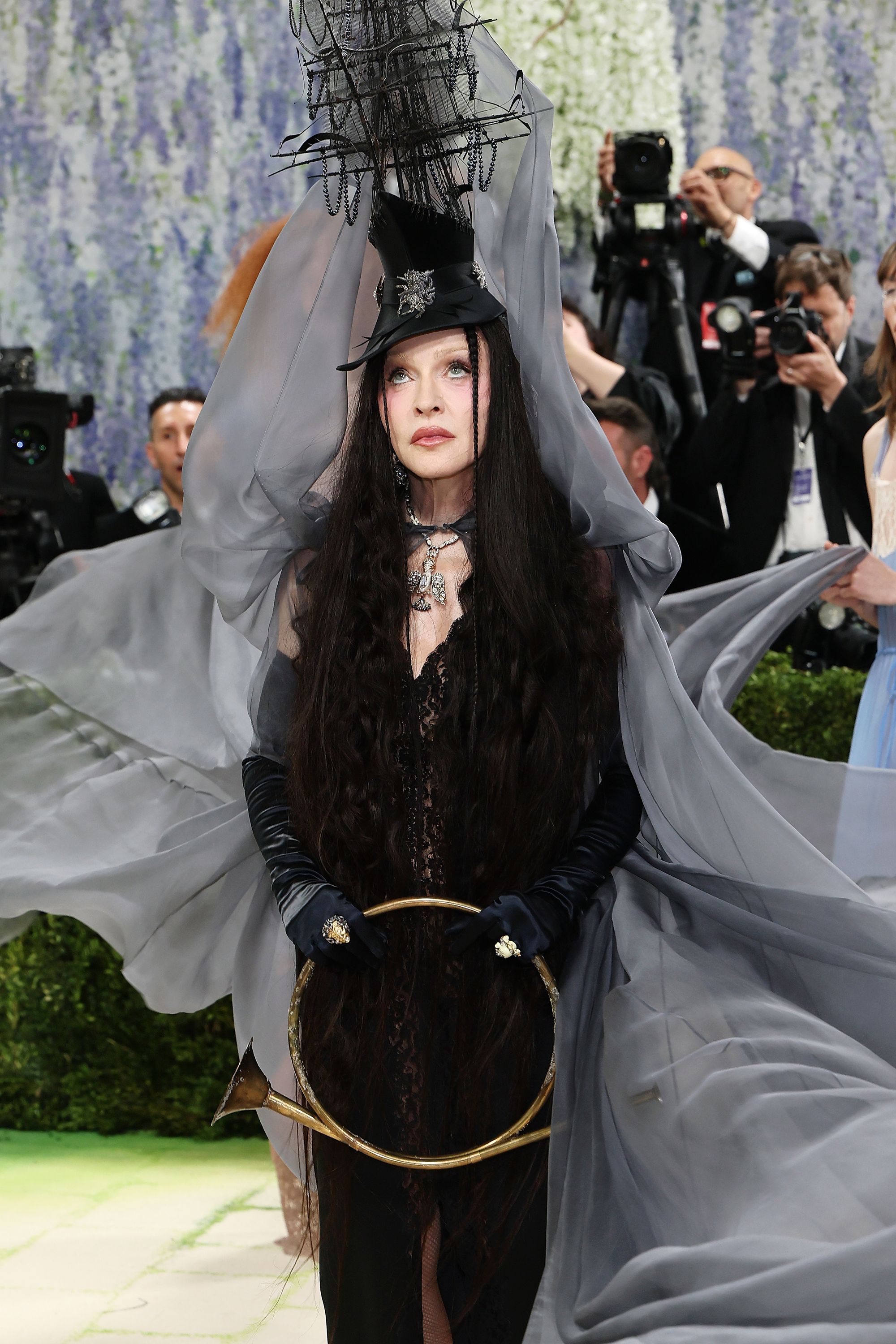 Madonna channelled a spooky vibe, wearing an Anthony Vaccarello Saint Laurent design, accessorized with a pirate-ship hat and a brass circular trumpet
