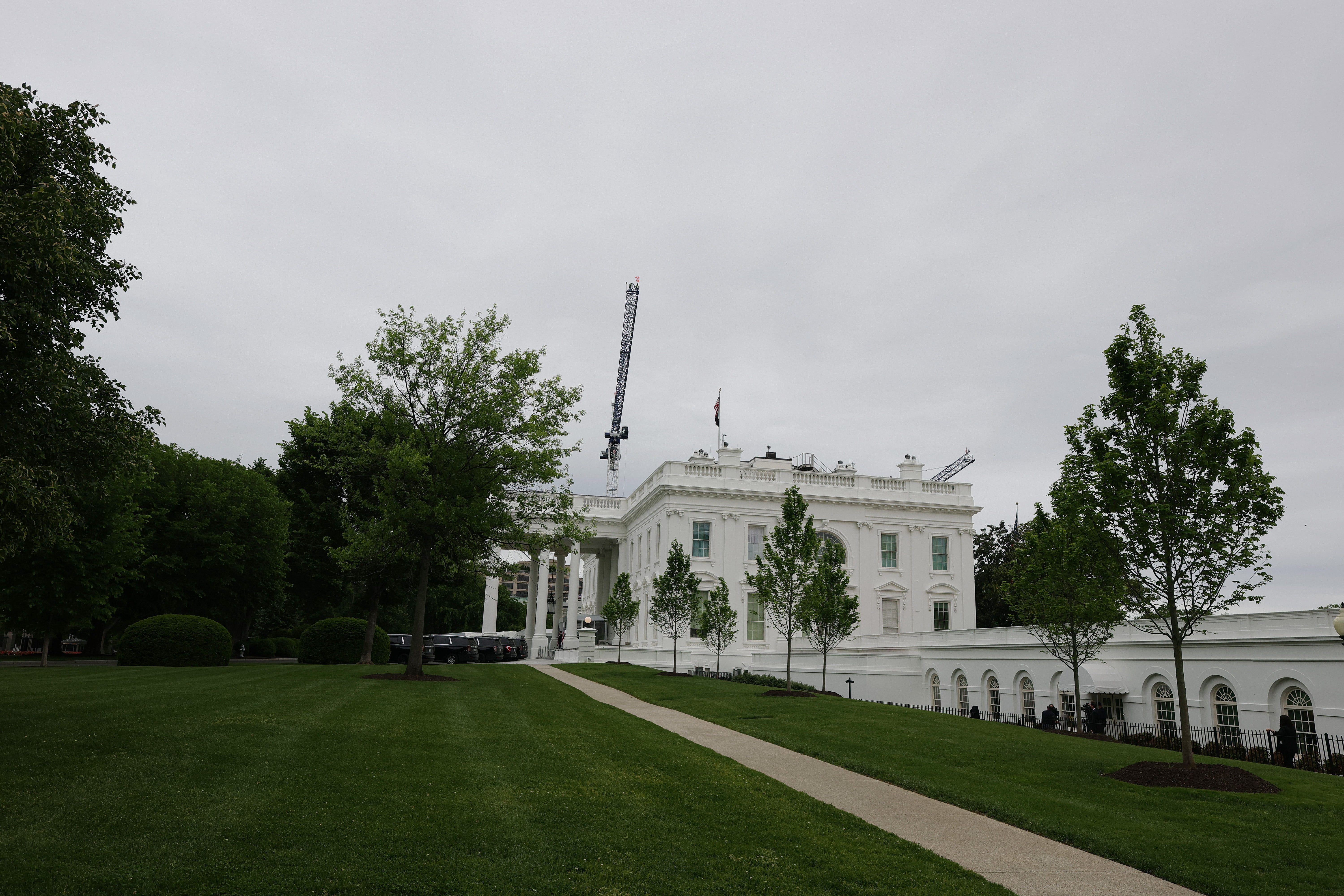 Cranes loom complete nan White House arsenic activity continues connected Trump's ballroom, which looks group to costs arsenic overmuch arsenic $400 million