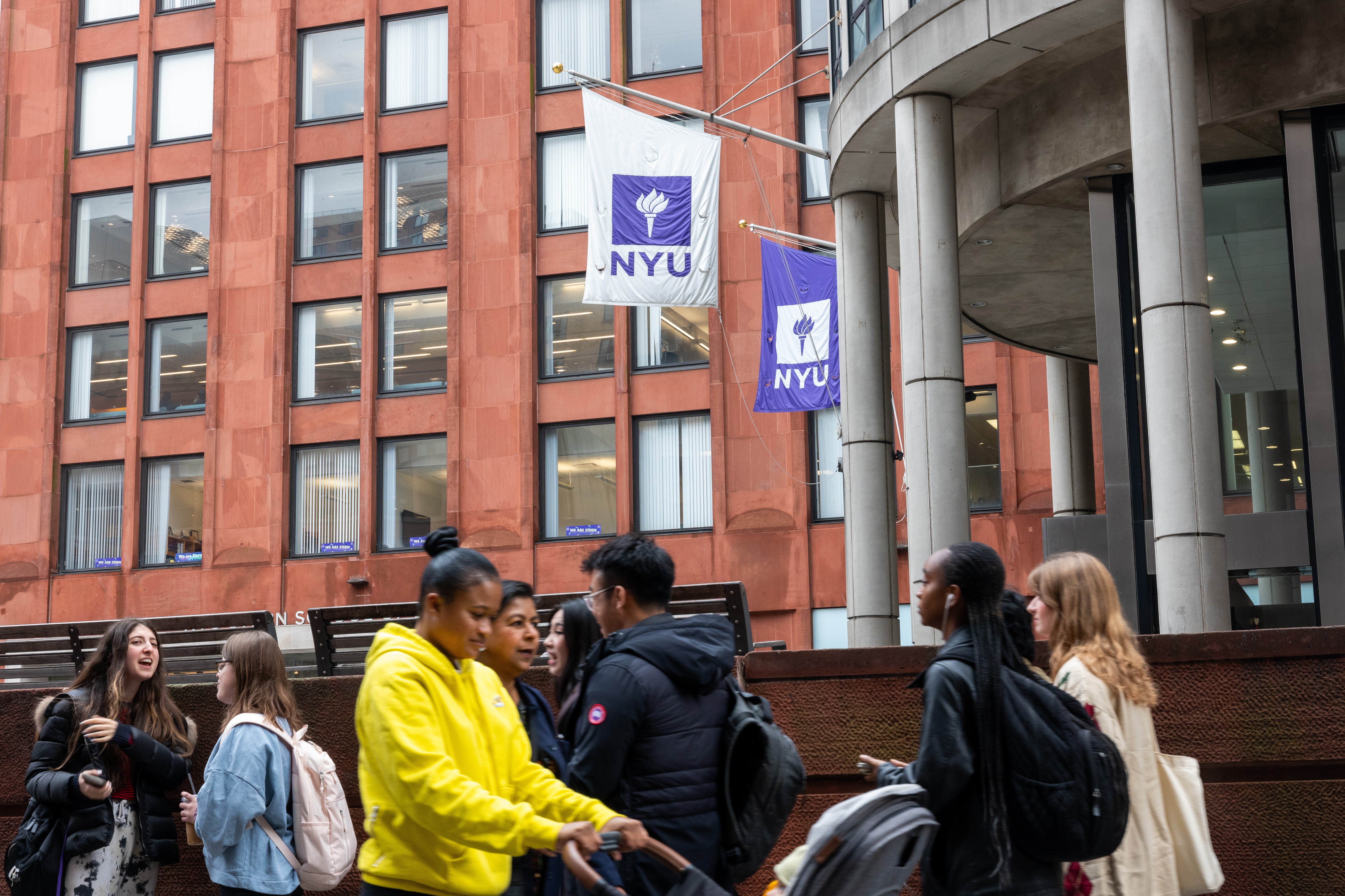 A flag featuring a Star of David and swastikas flew over a building at the NYU campus on Thursday, outraging students and local officials