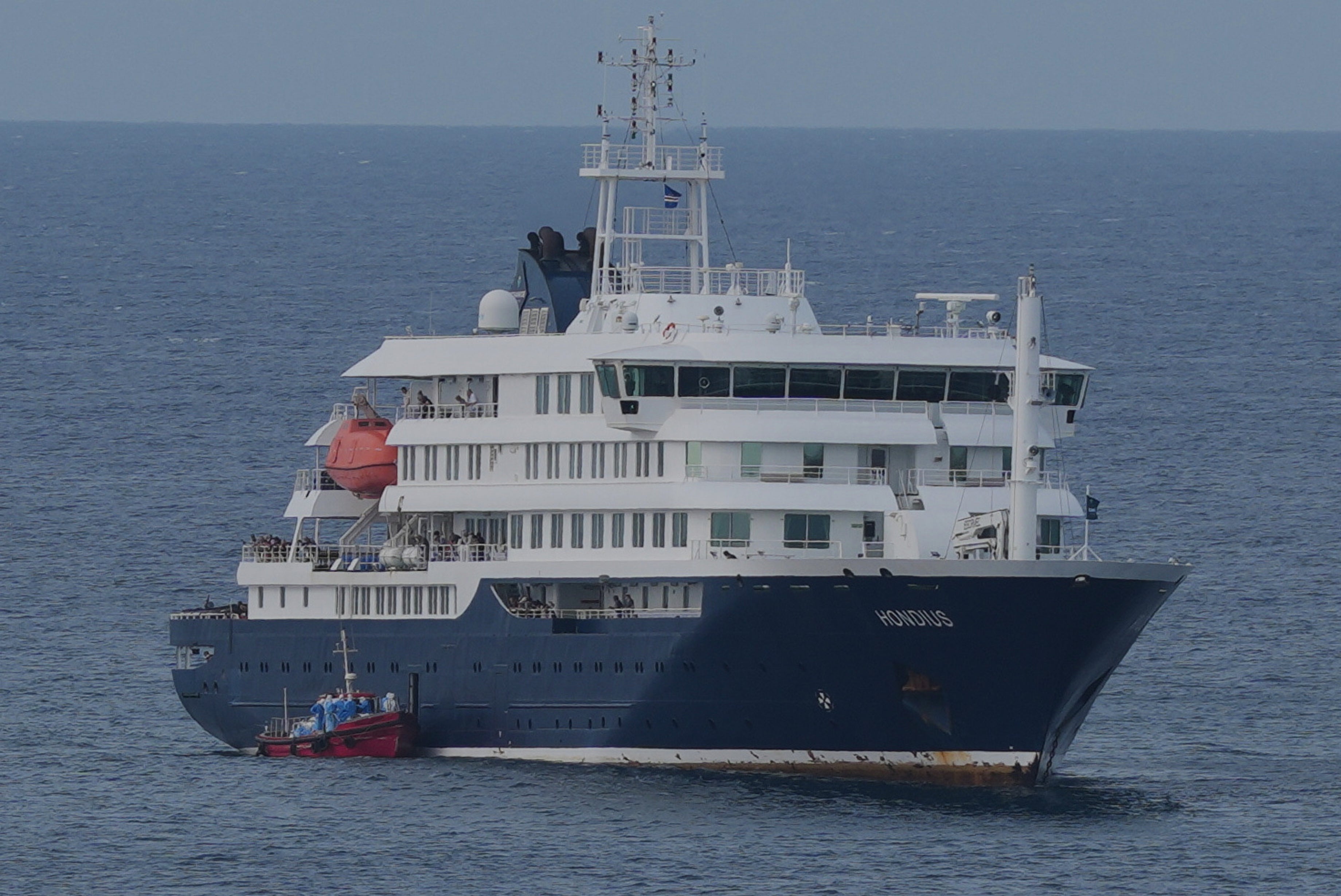 The MV Hondius cruise vessel is anchored astatine a larboard successful Praia, Cape Verde