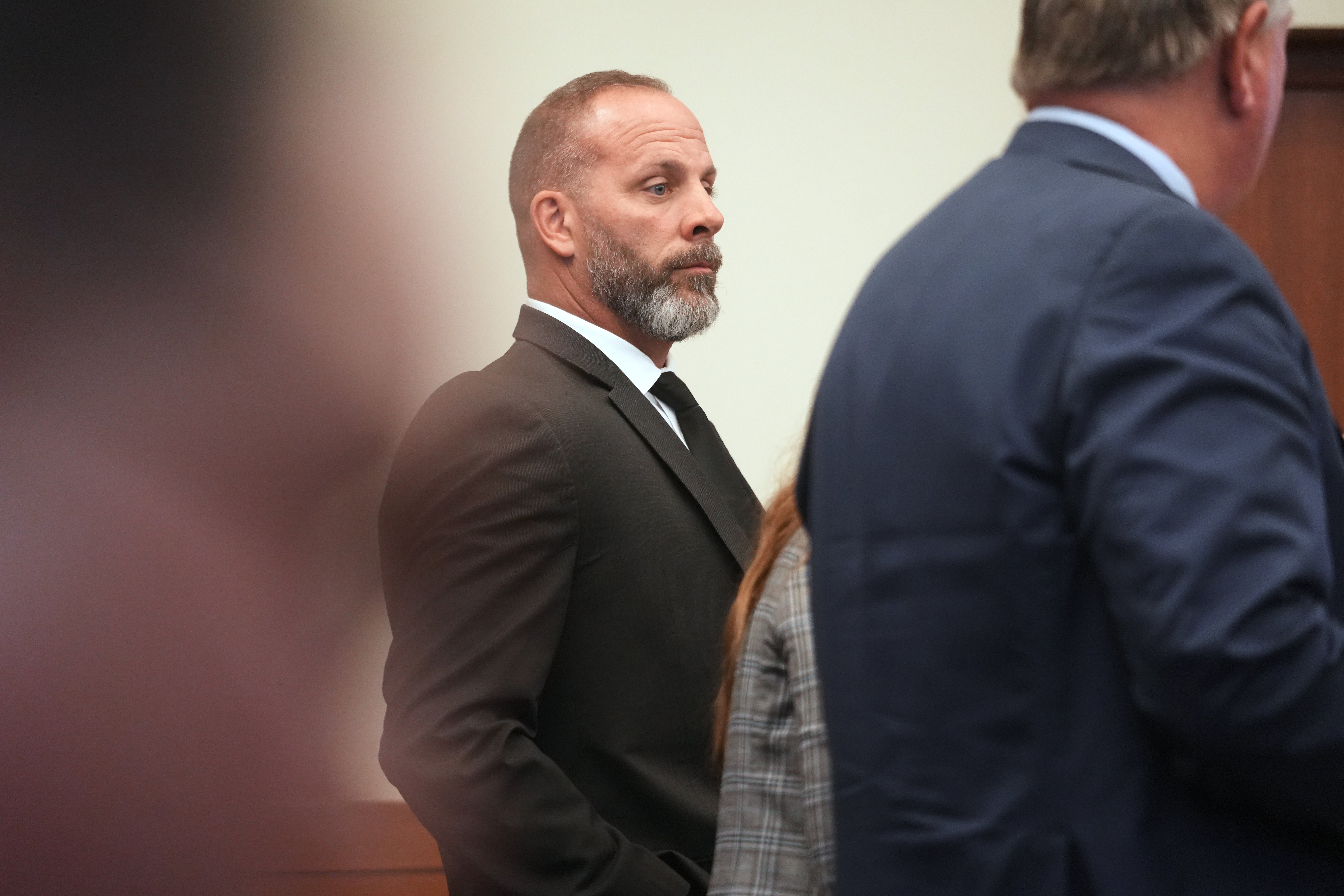 Former sheriff's lawman Jason Meade stands during closing arguments of his retrial