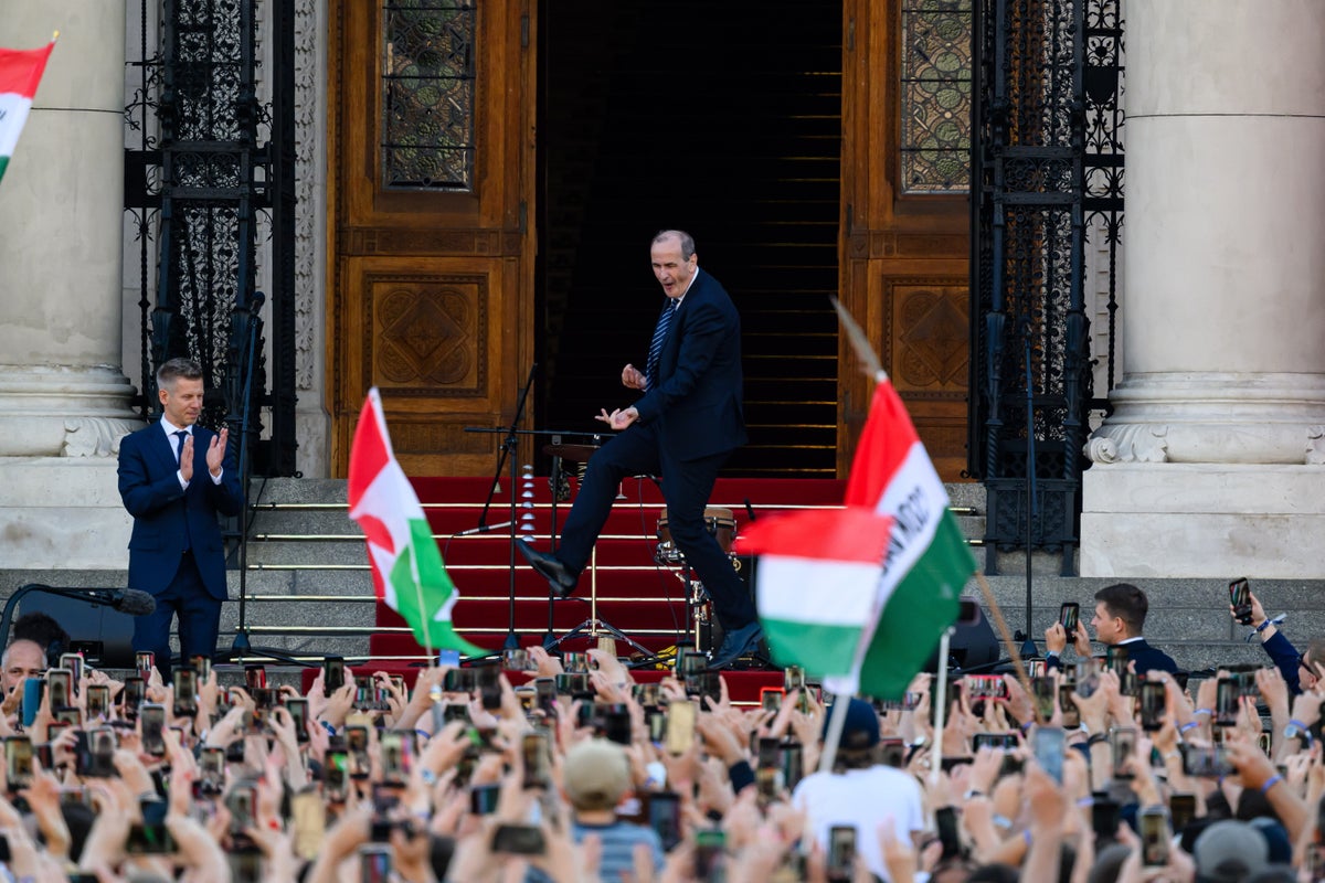 Who is Hungary’s dancing health minister? Former NHS doctor who plays air guitar at political rallies