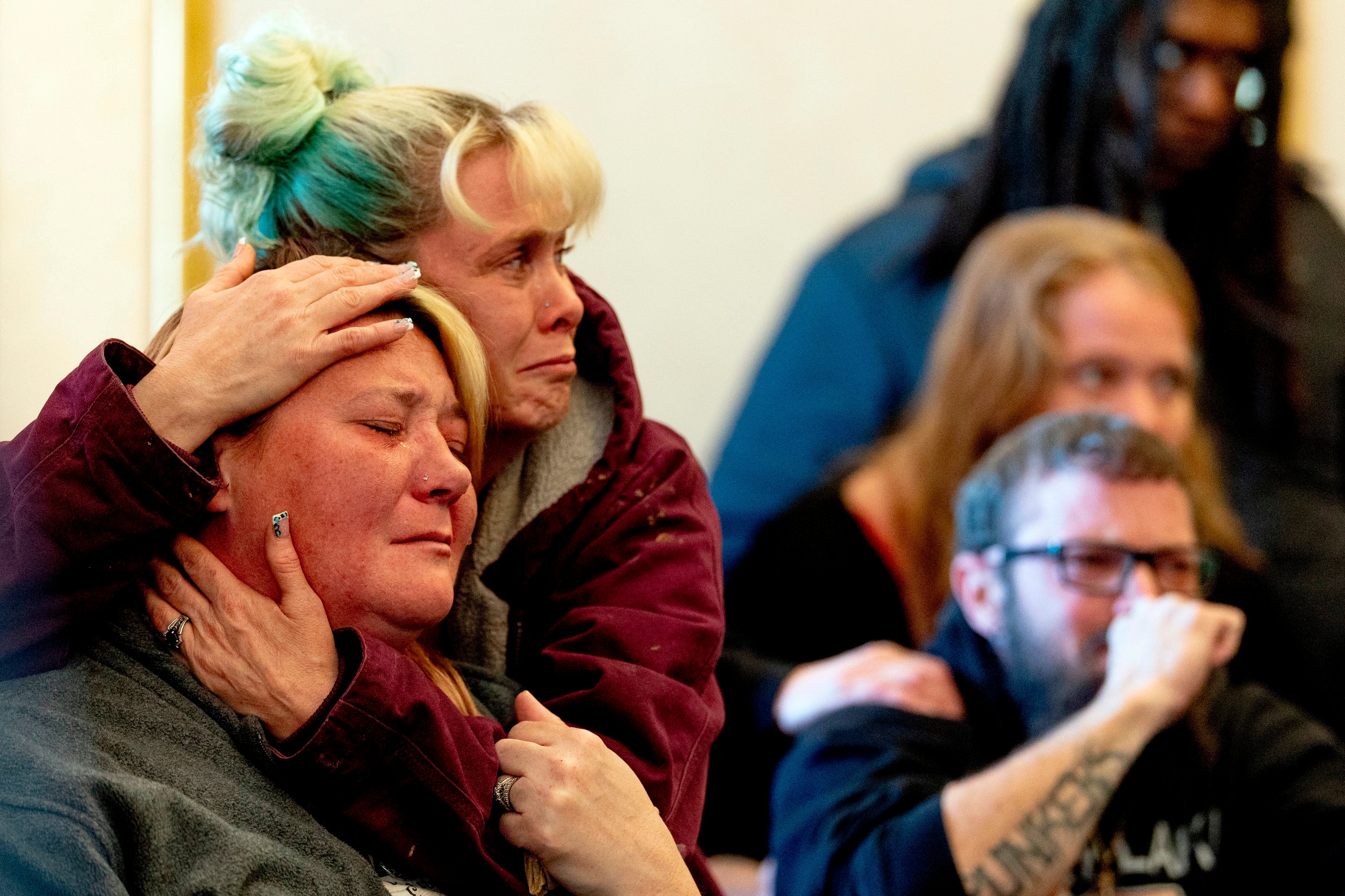 Family members react as James Shirah is sentenced to at least 30 years in prison on Monday, May 11, 2026 in Flint. (Jake May/The Flint Journal via AP)
