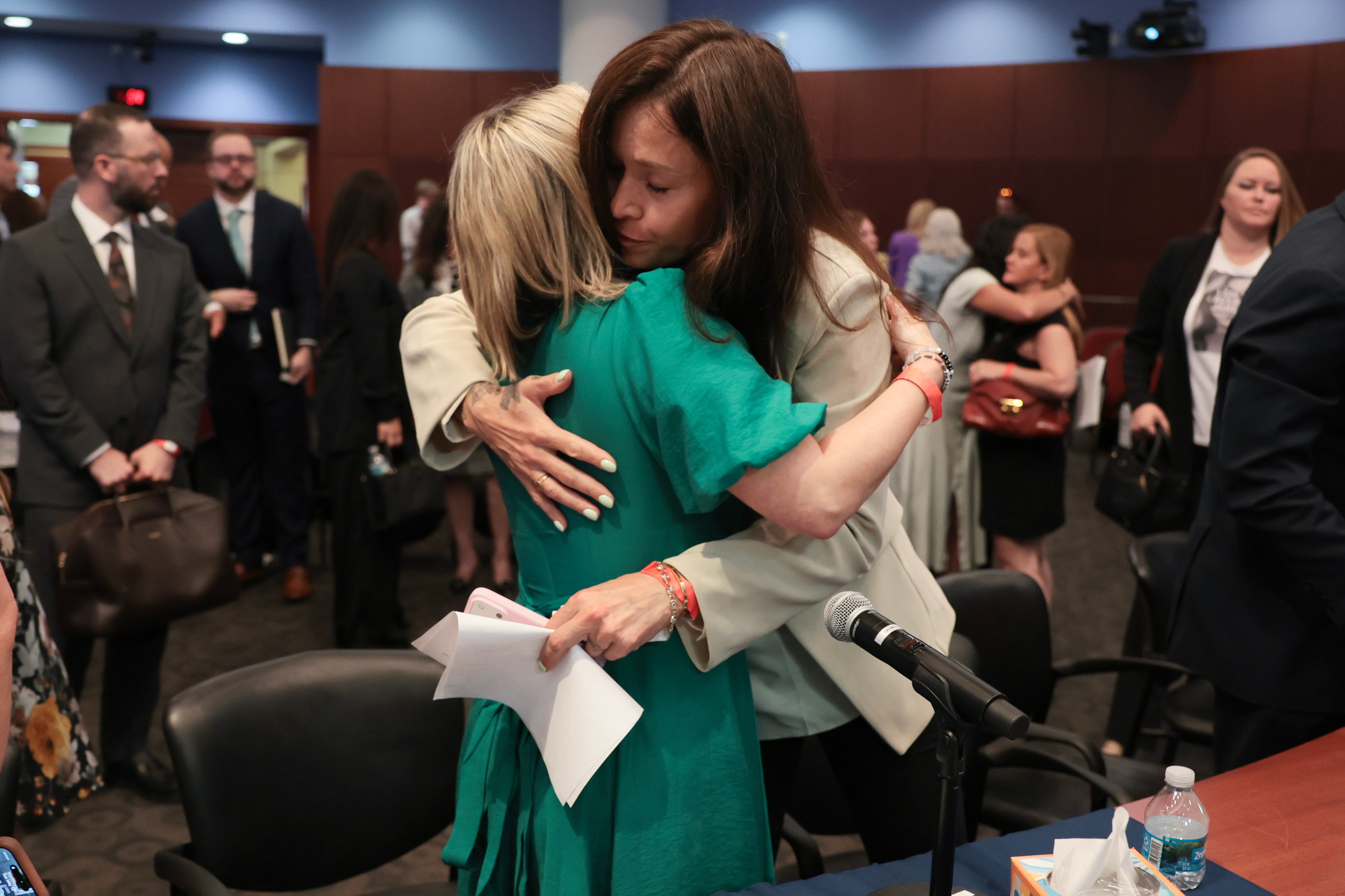 The witness was comforted by fellow abuse survivor Dani Hannah Bensky after delivering her testimony