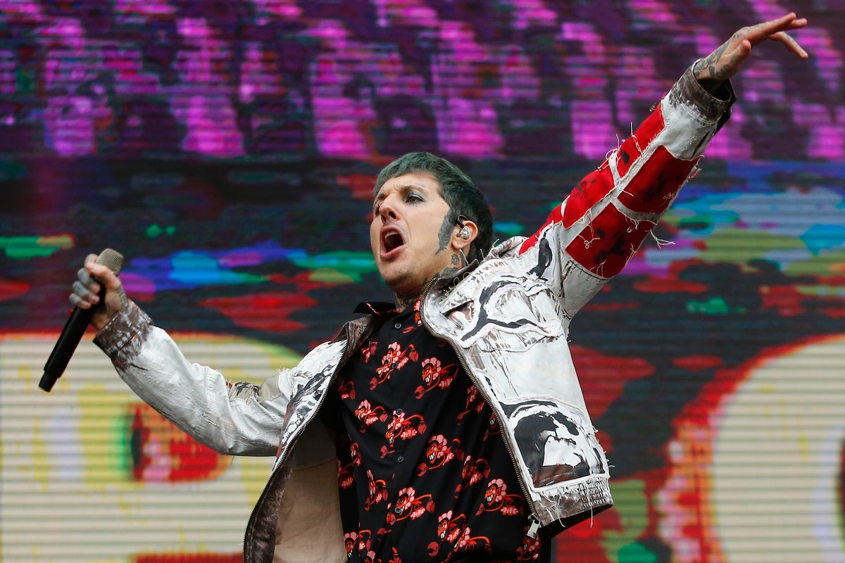 Emo band frontman suffers concussion after someone threw a phone at him mid-show