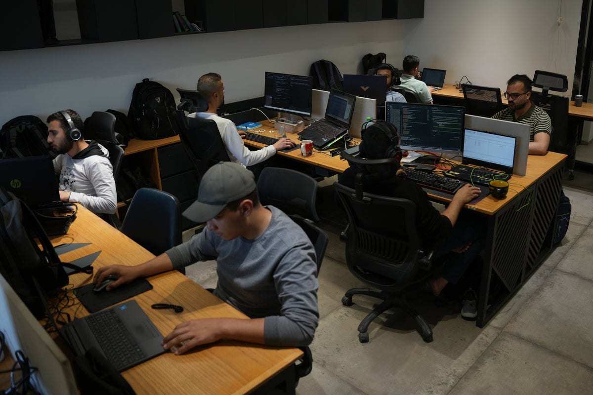 Bombs and bank restrictions: Gaza’s digital workers freelancing through blackouts