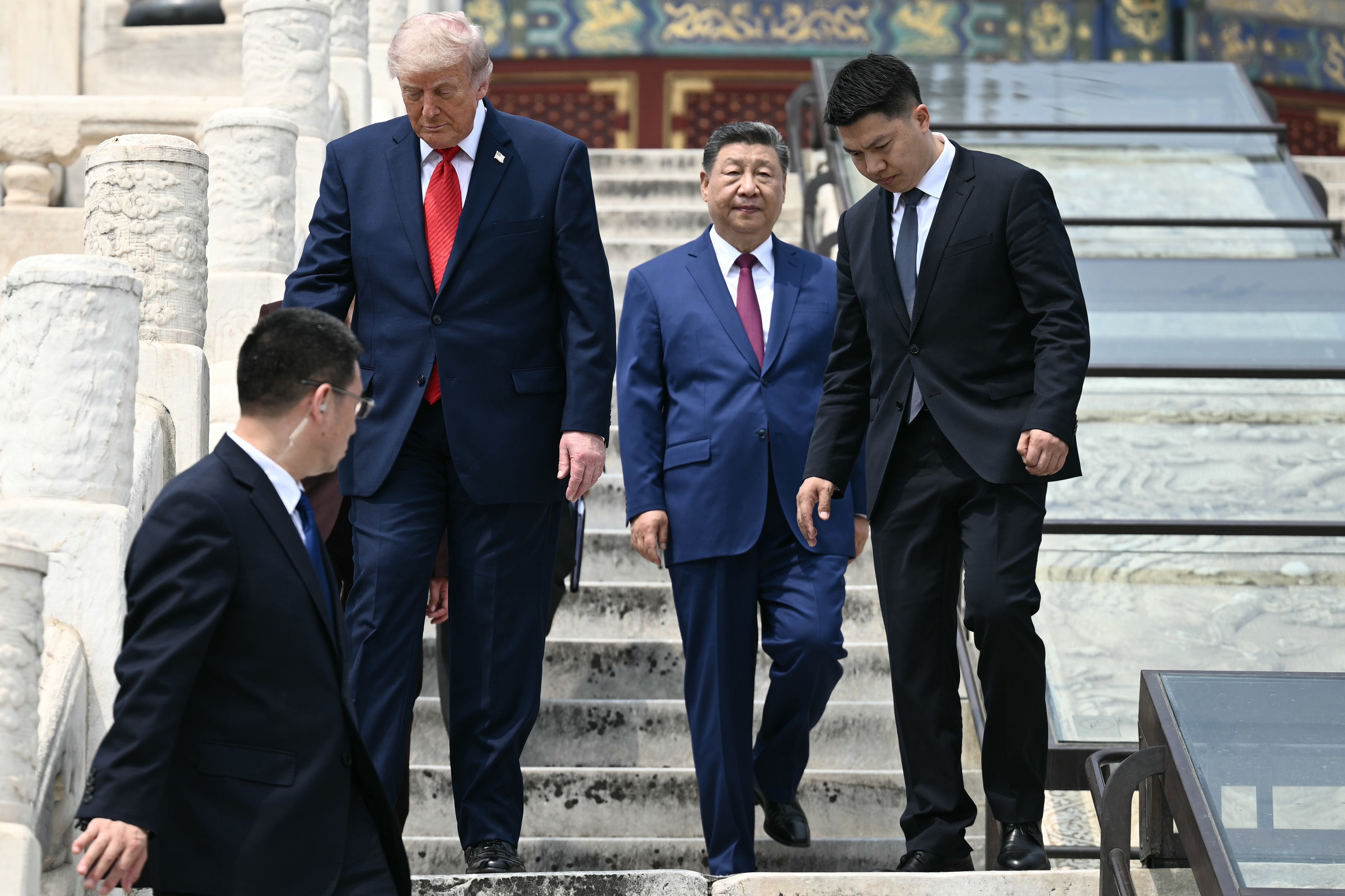 China's President Xi Jinping (2nd R) and US President Donald Trump (2nd L) visit the Temple of Heaven on May 14