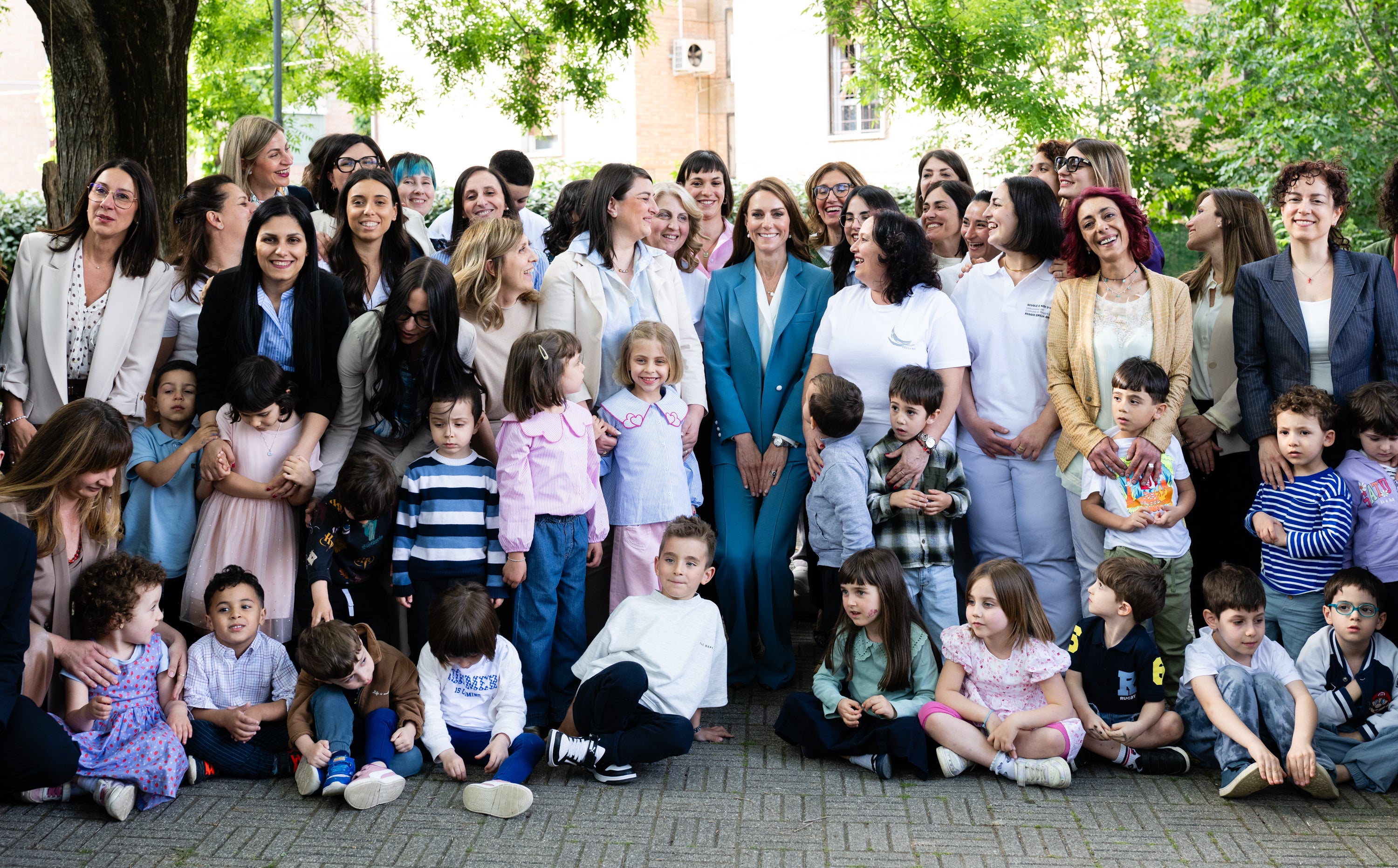 The Princess of Wales smiling with visitors