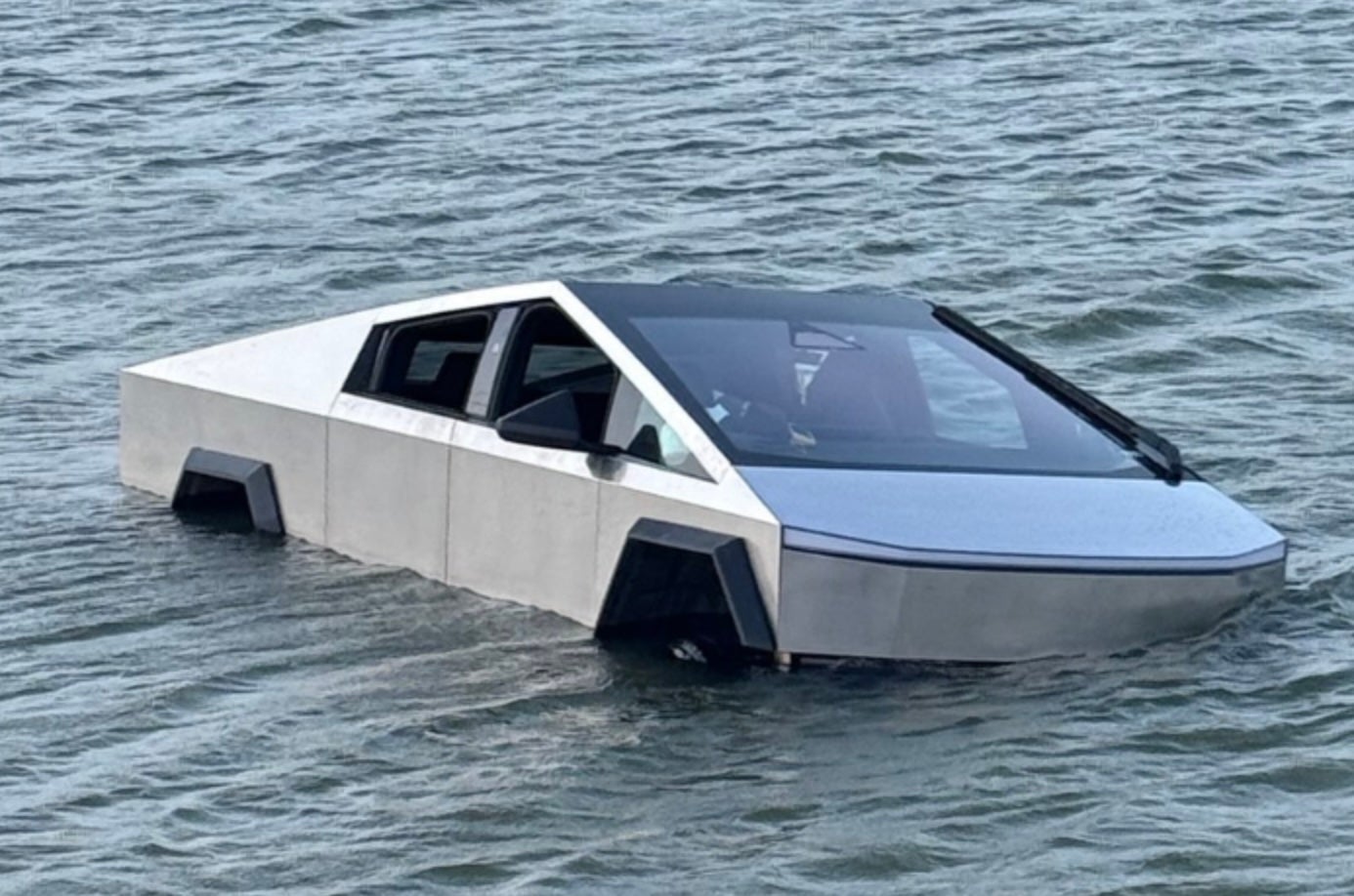 A Cybertruck driver in Texas has been arrested after he drove his car into a lake using Tesla’s “Wade Mode” feature, police said