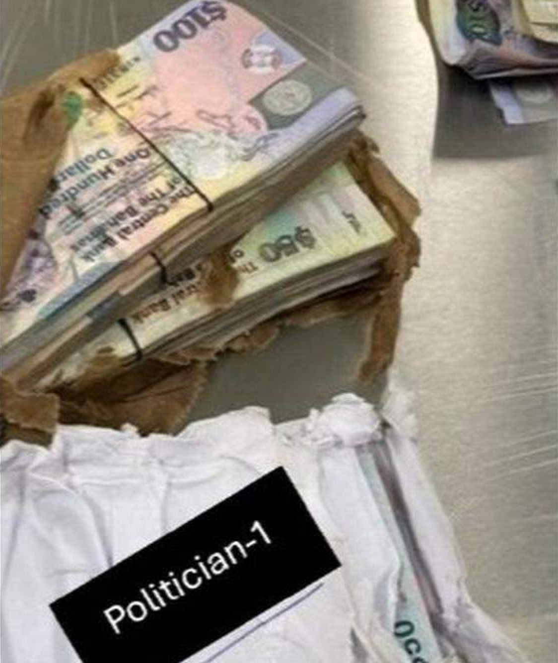 The brown paper bag of cash was reportedly labeled with the name of a Bahamian politician. The politician’s name was described in court documents only as 'Politician-1'