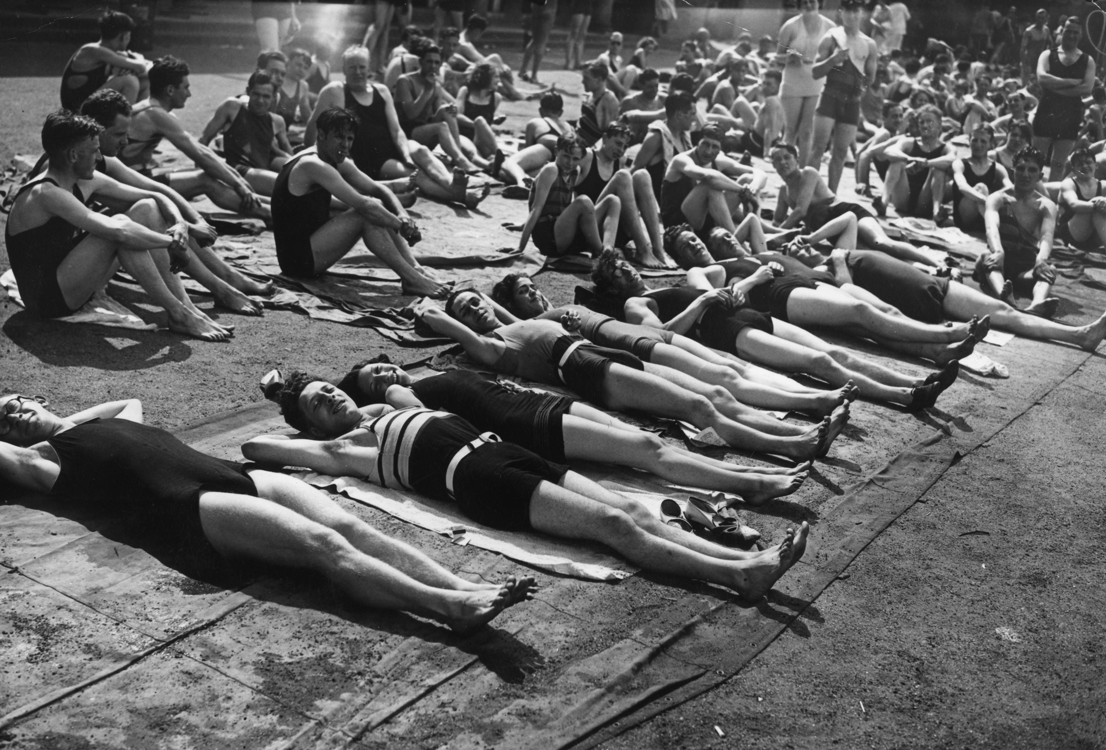 Beat the heat: Expect to see many swimmers chilling in the Hyde Park sun this weekend, like these people almost a century ago