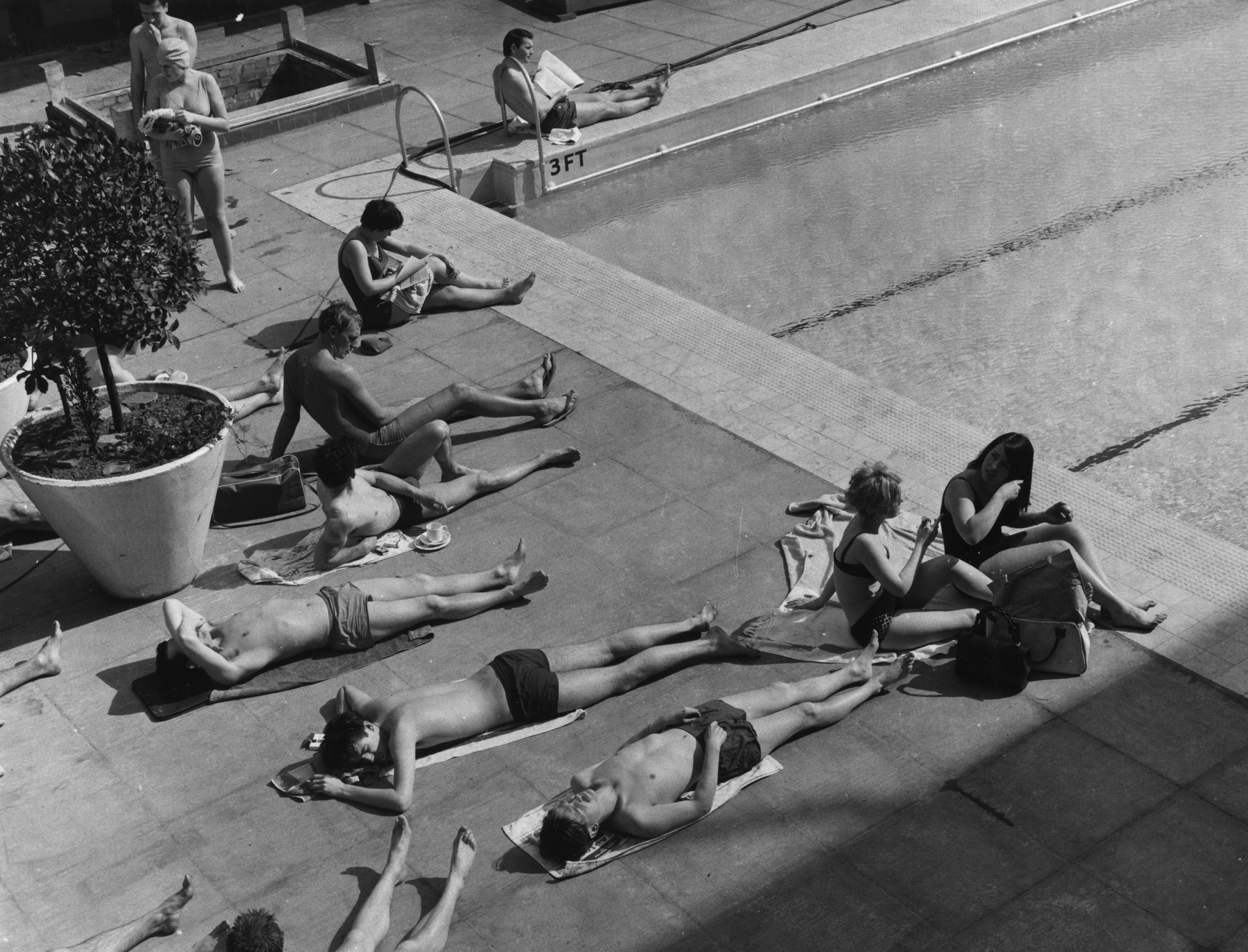 More than just a pool: Patrons relax at Holborn’s Oasis lido in 1965
