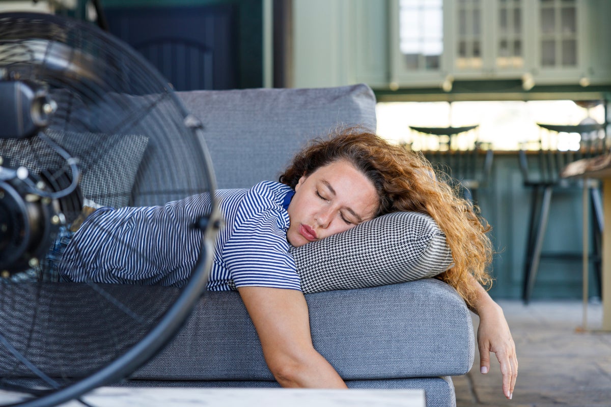 Doctors share what sleeping with a fan on does to your body and health - The Independent