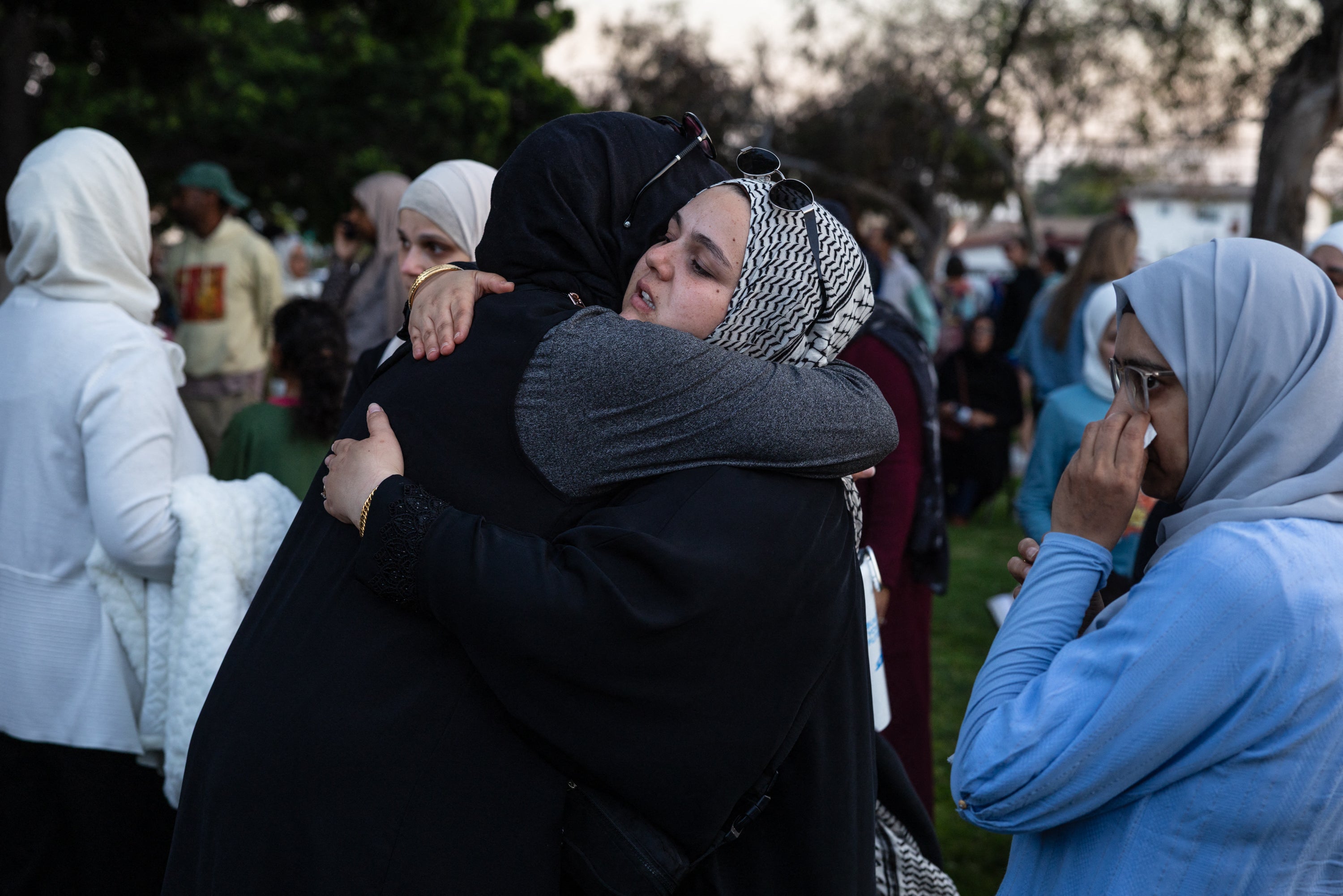 Mourners console each different astatine an affectional vigil for nan victims