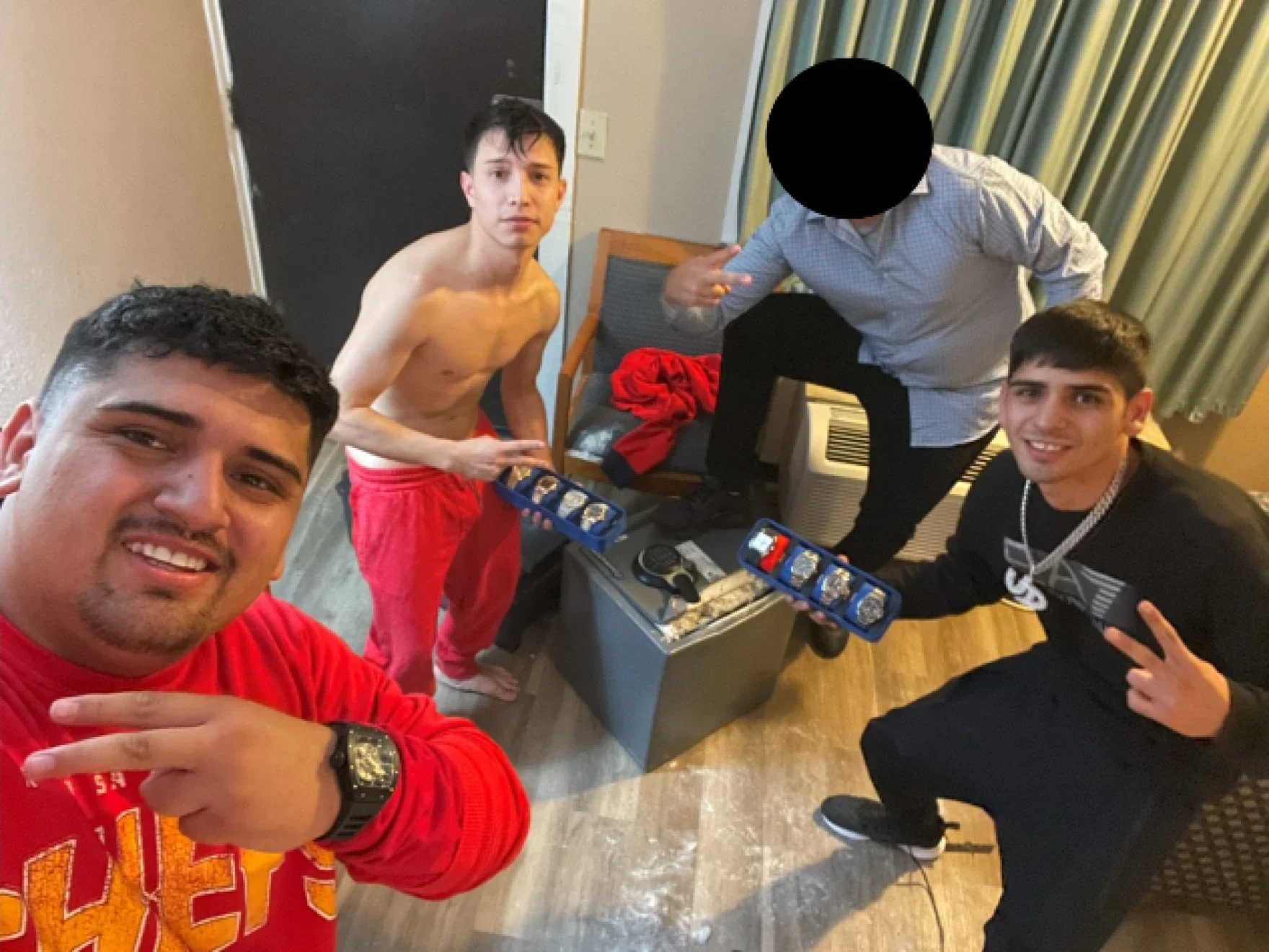 This recovered iCloud photo is included in the DOJ’s complaint against the suspects and shows Pablo Zuniga Cartes, Ignacio Zuniga Cartes, Bastian Jimenez Freraut and an unidentified fourth suspect