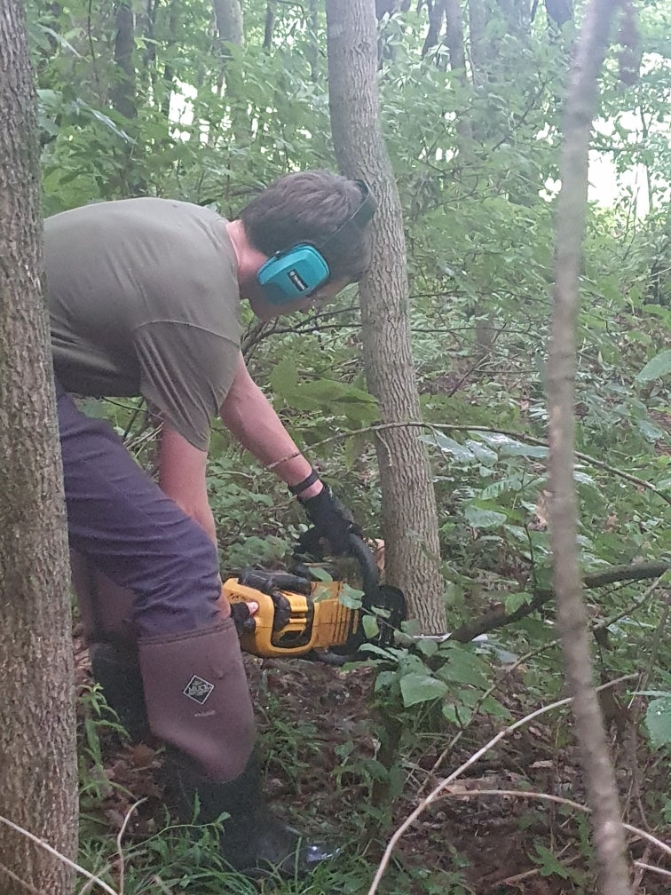 Derrendinger said it is ‘safer to springiness my kids a chainsaw than entree to societal media.’ Her teenage boy uses nan powerfulness instrumentality to trim wood (pictured) for nan mini maple syrup cognition he runs pinch his siblings successful agrarian Vermont