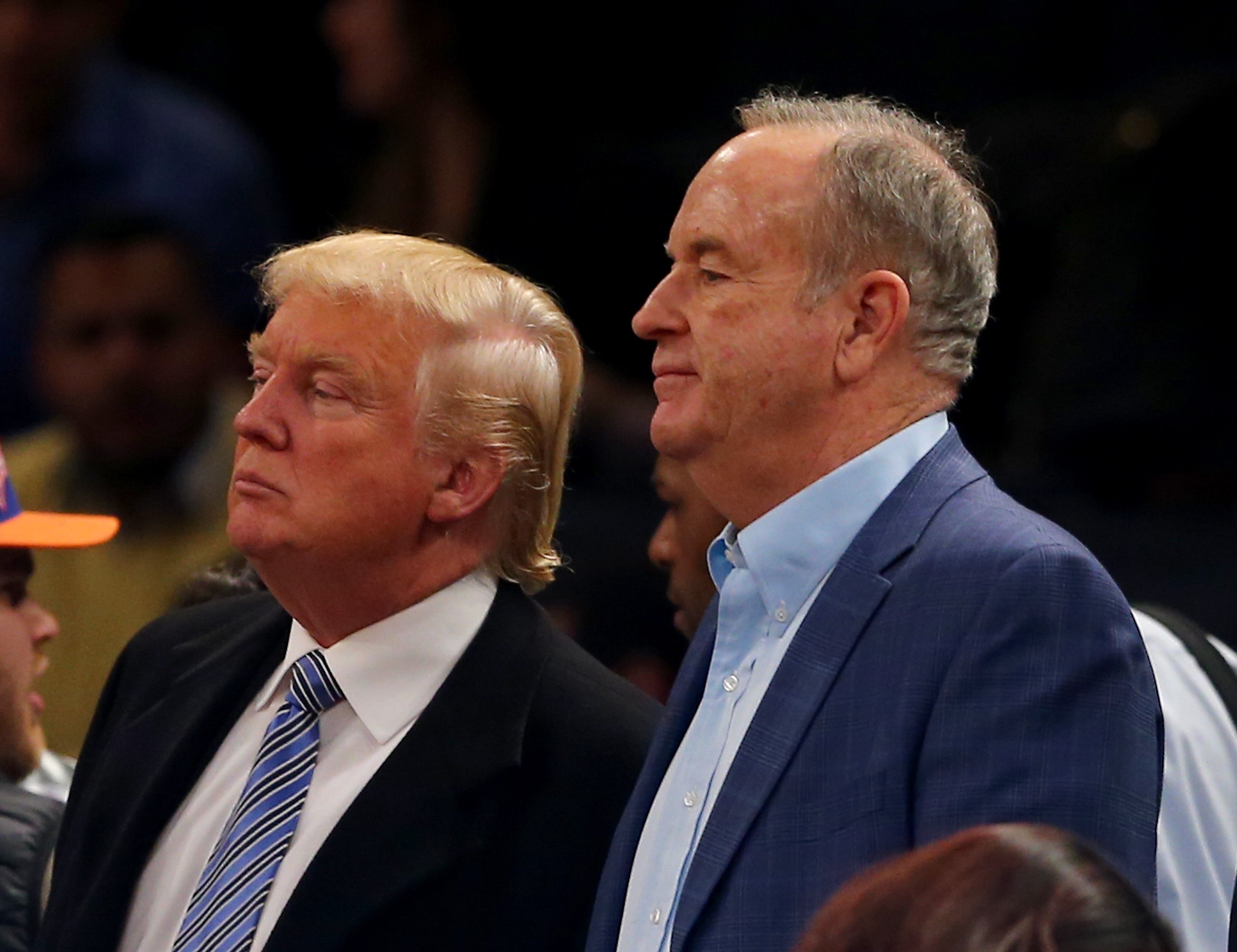 Trump i konzervativni komentator Bill O'Reilly posjećuju NBA utakmicu između New York Knicksa i Cleveland Cavaliersa u Madison Square Gardenu 2014.