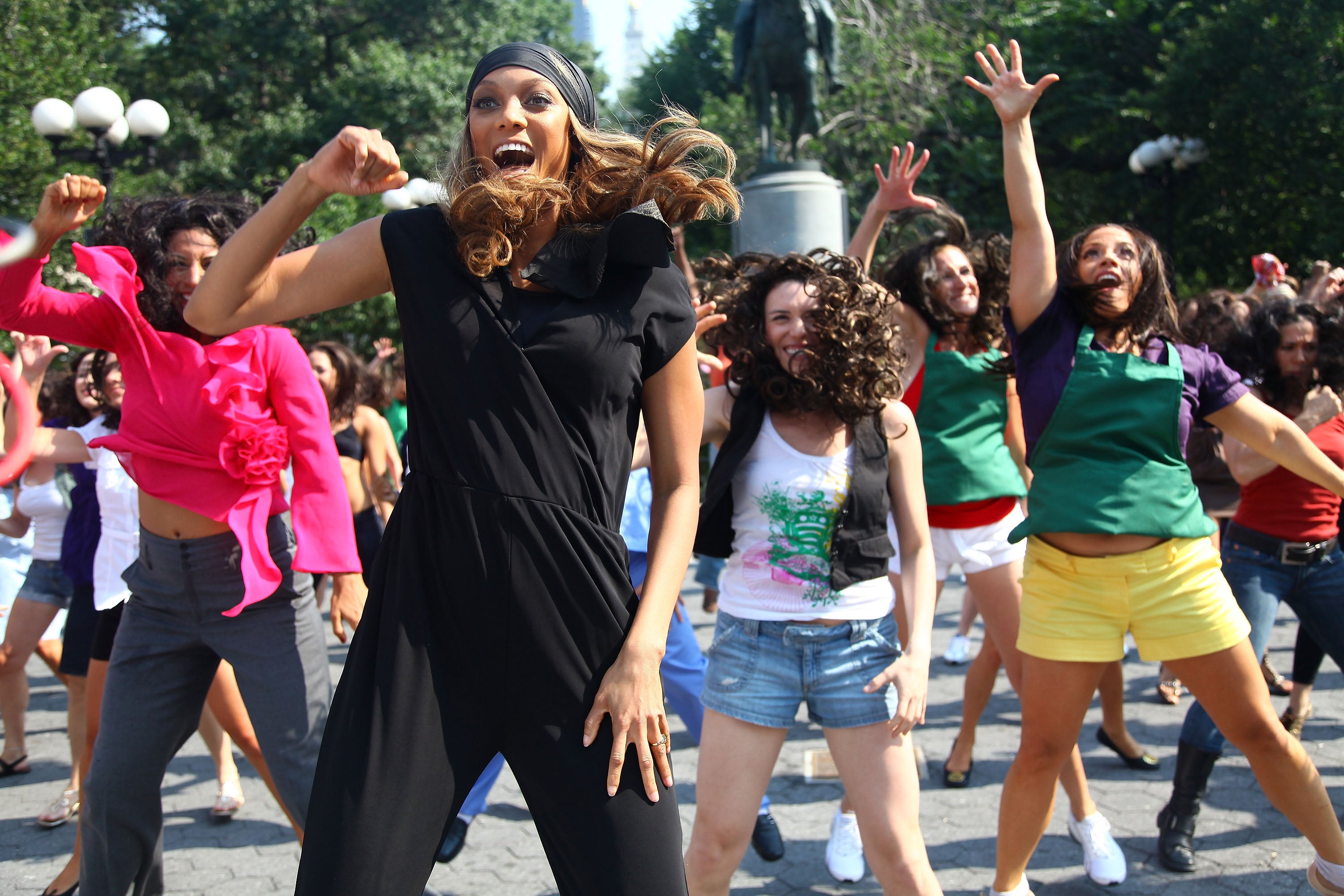 Model Tyra Banks participates in a dance flash mob in New York City’s Union Square on Aug. 17, 2009. One expert said the takeover trend is similar to ‘flash mobs’ from years ago