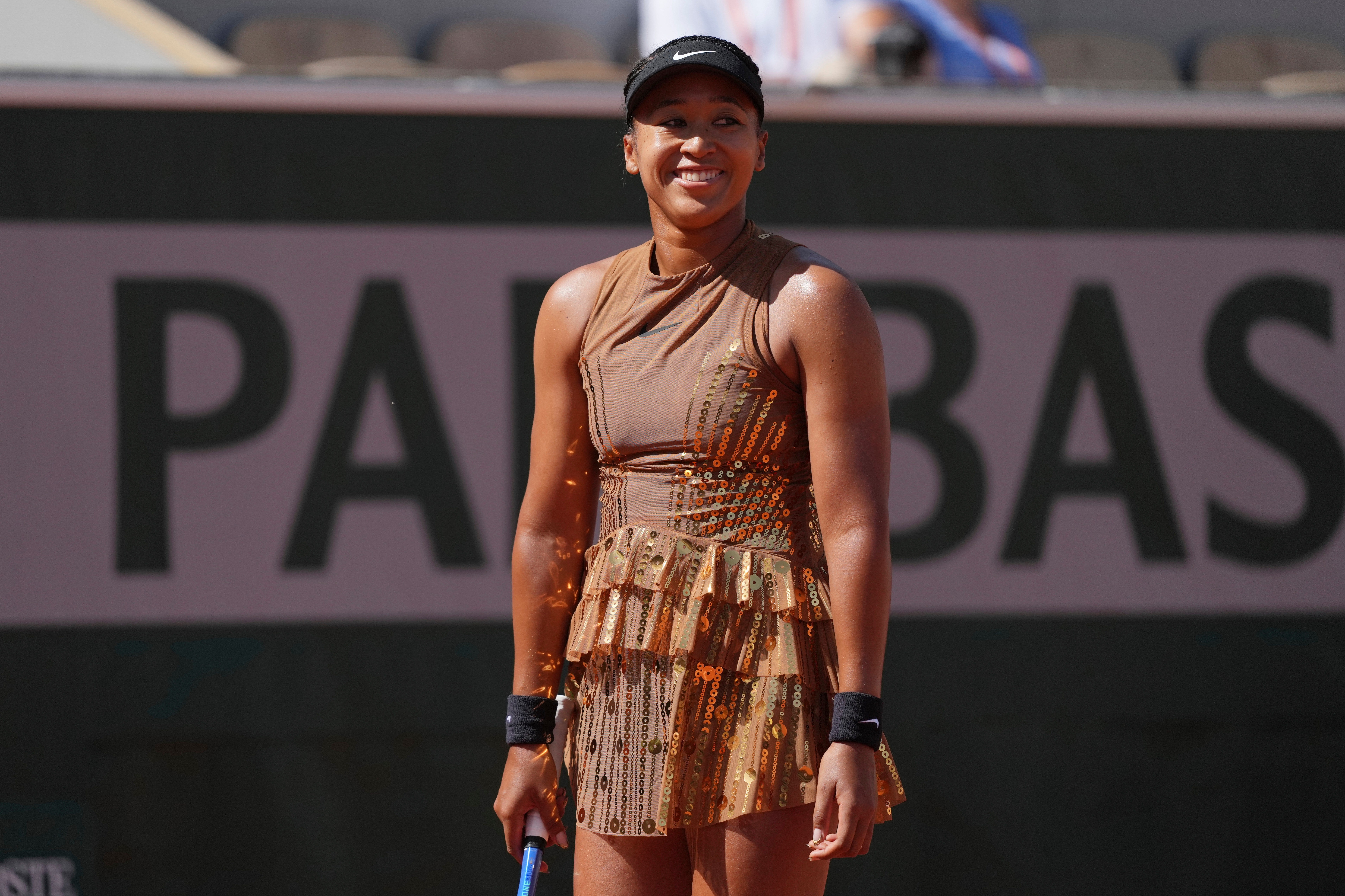 Glittering: The four-time Grand Slam champion wore copper on the court