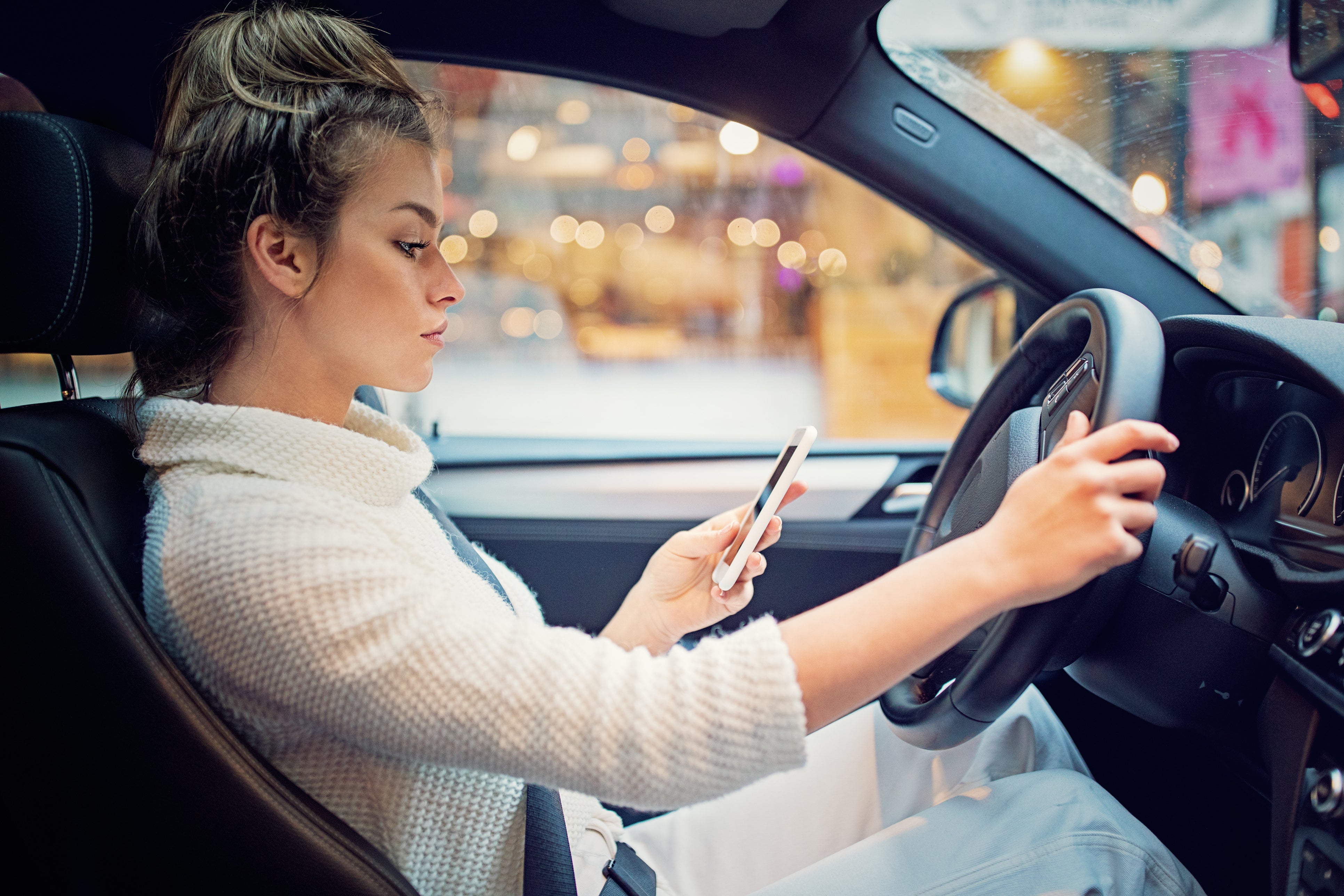 Number of UK motorists using phones illegally while driving reaches eight-year high