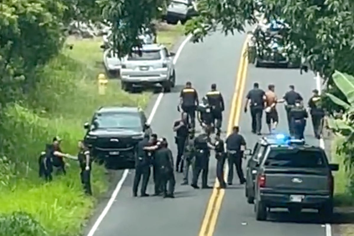 Suspect charged in killings of three people after Hawaii manhunt