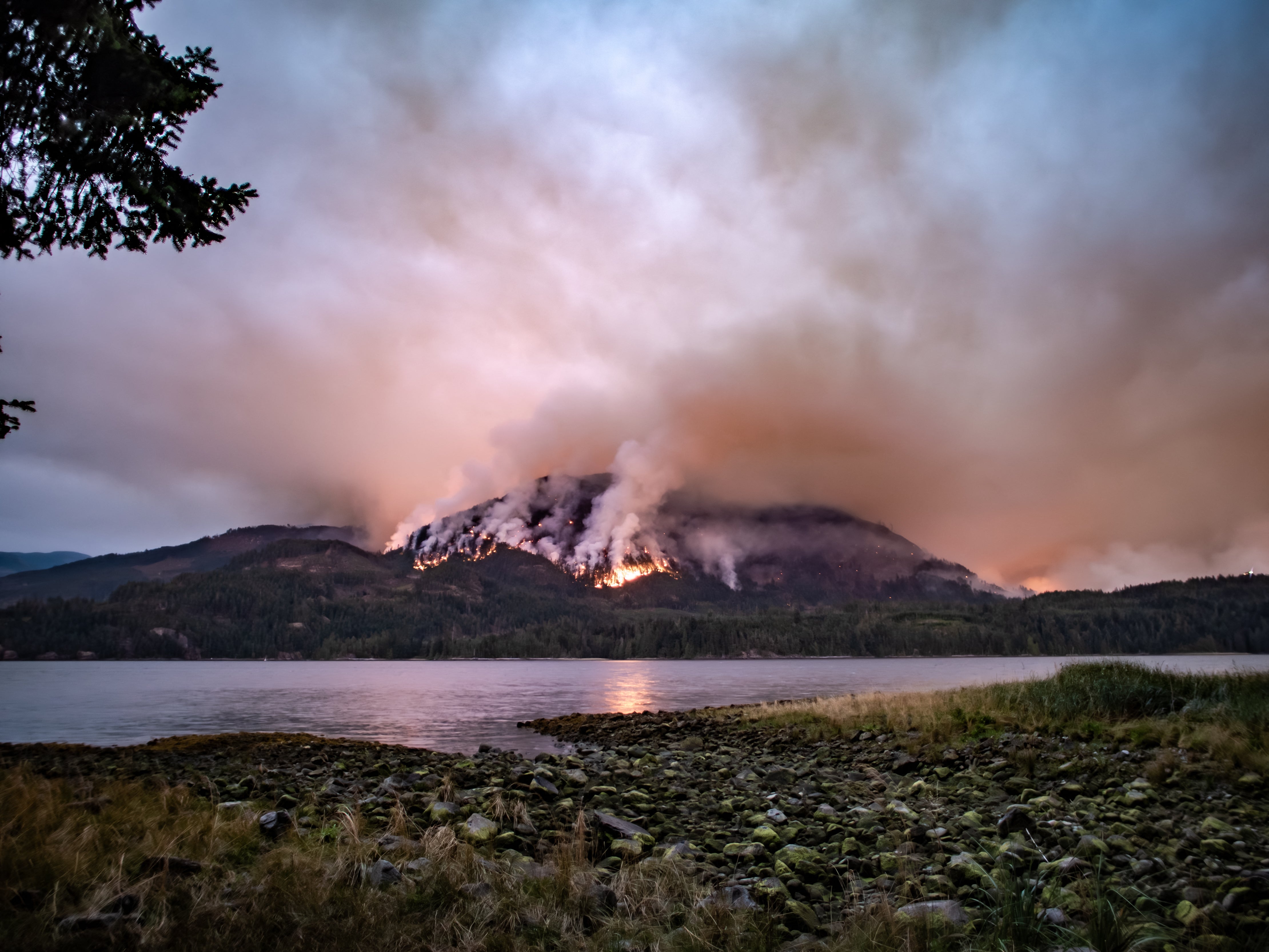 A wildfire burns connected Mount Underwood adjacent Port Alberni, connected Vancouver Island, British Columbia successful 2025