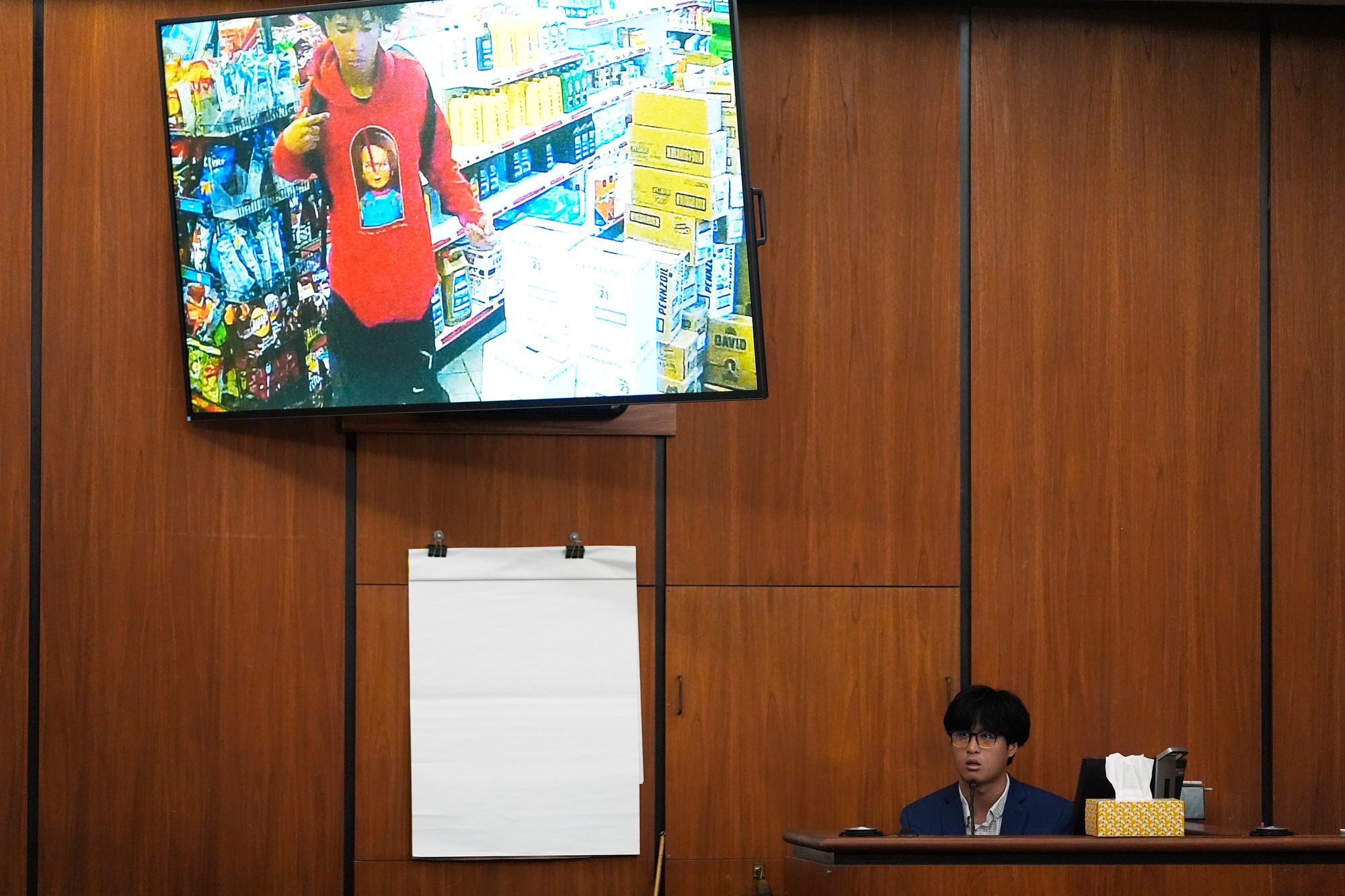 Andy Chow testifies as a defense witness in the murder trial against his father Chikei Rick Chow